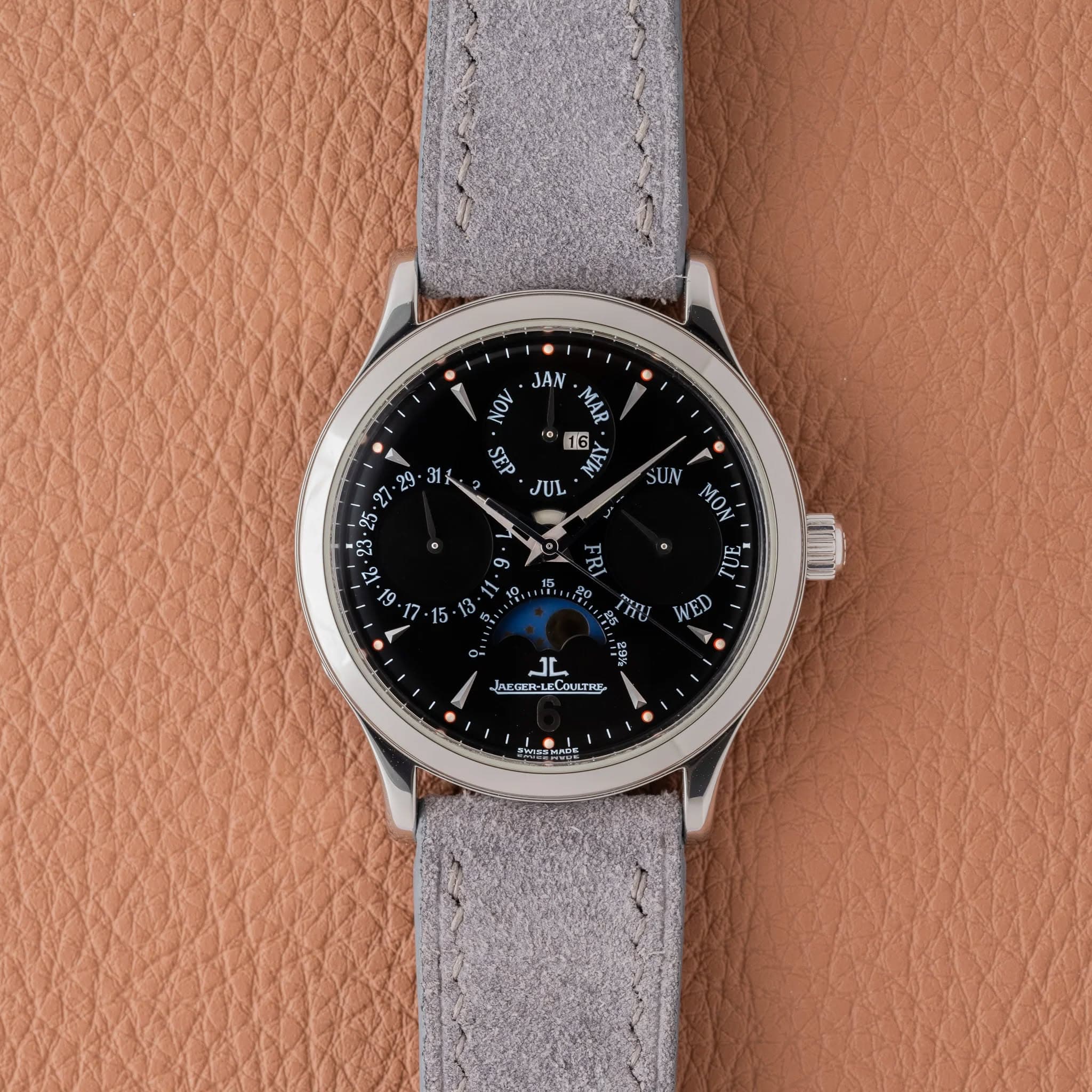 May be an image of leather and wrist watch