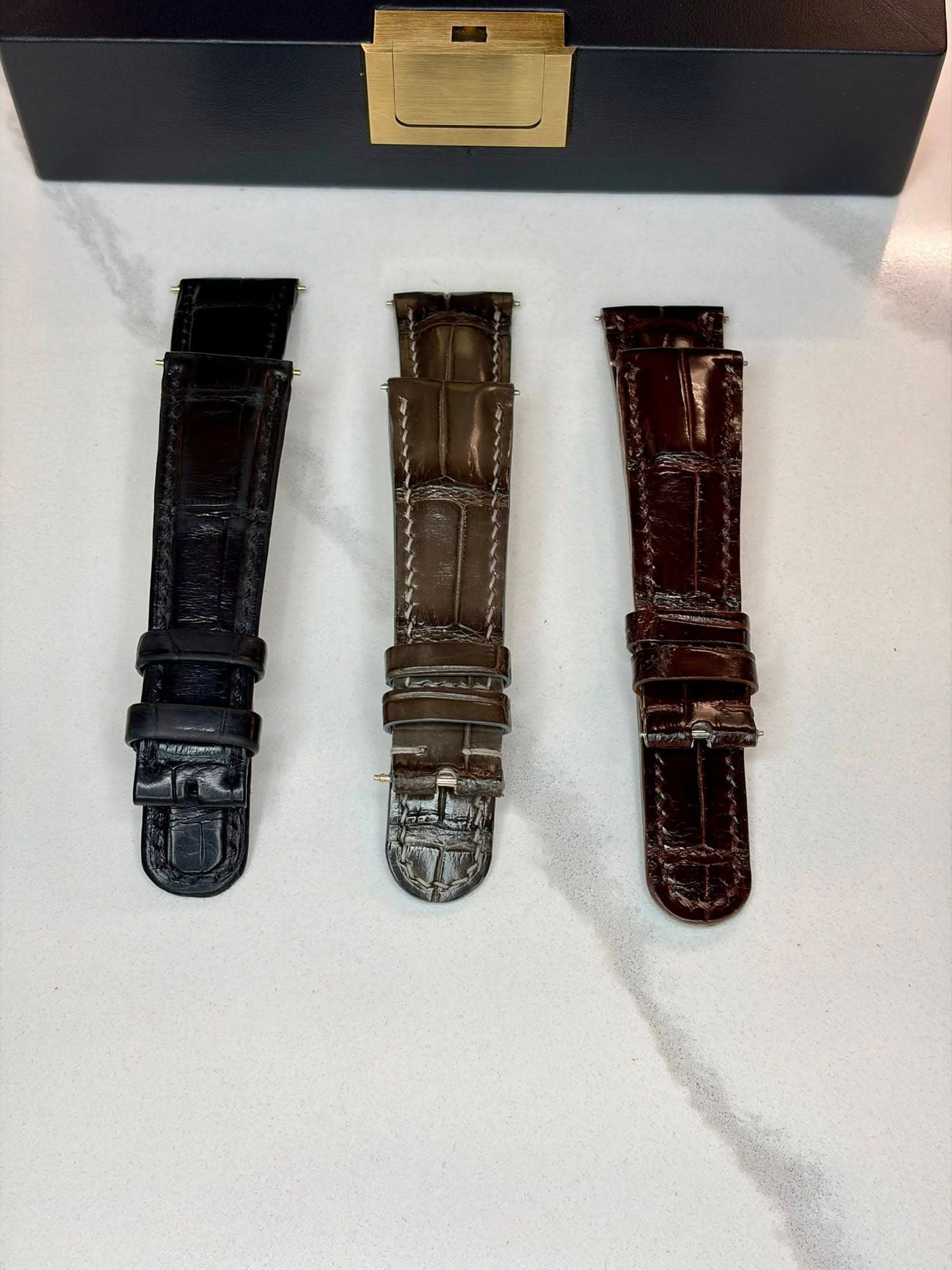 May be an image of leather, saddle-stitched leather, wrist watch and text
