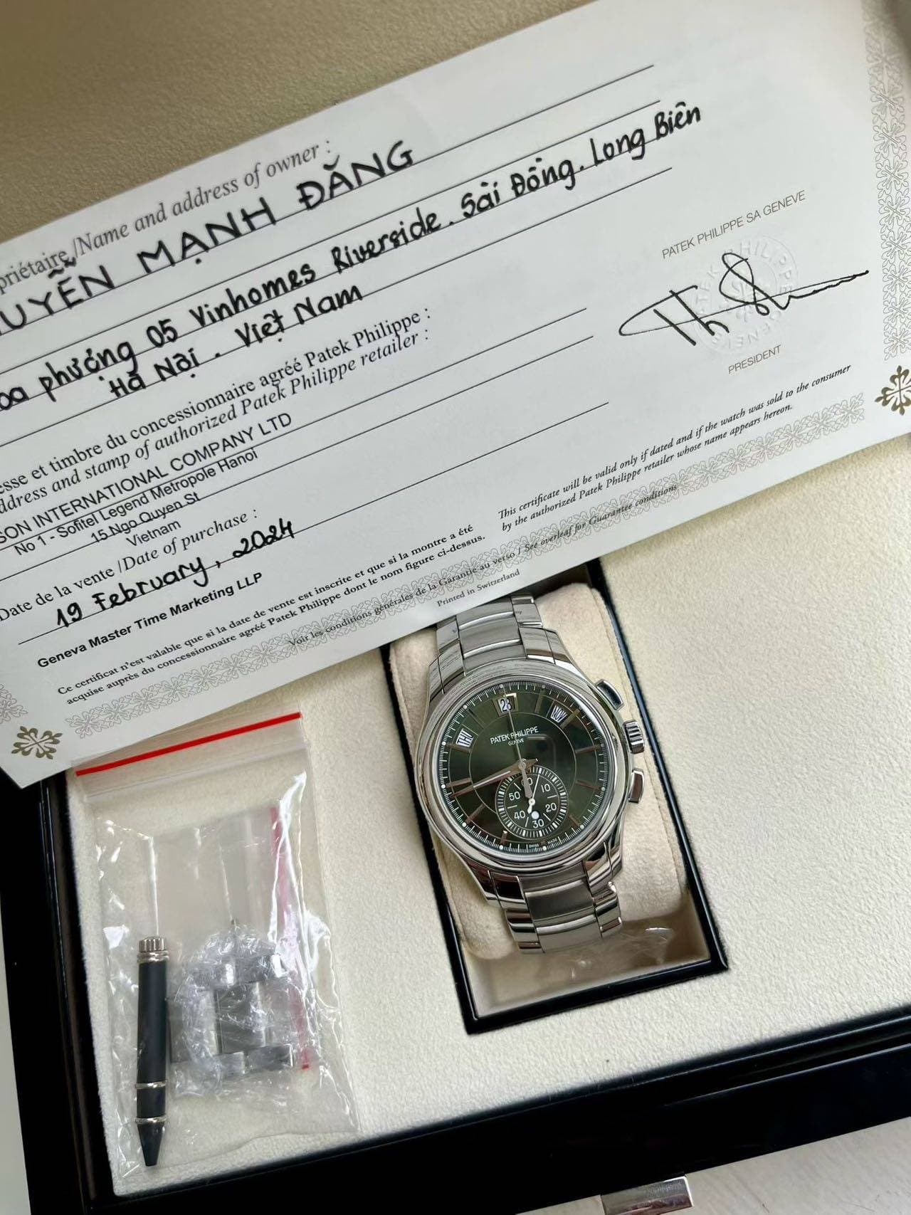 May be an image of wrist watch and text that says 'Biên HUPPE SA S4 GENEVE PATEK address of owner ĐĂNG sải Đông. /Name and nétaire, Riverside UYEN 05 Vinhomes Viet Nam Philippe…