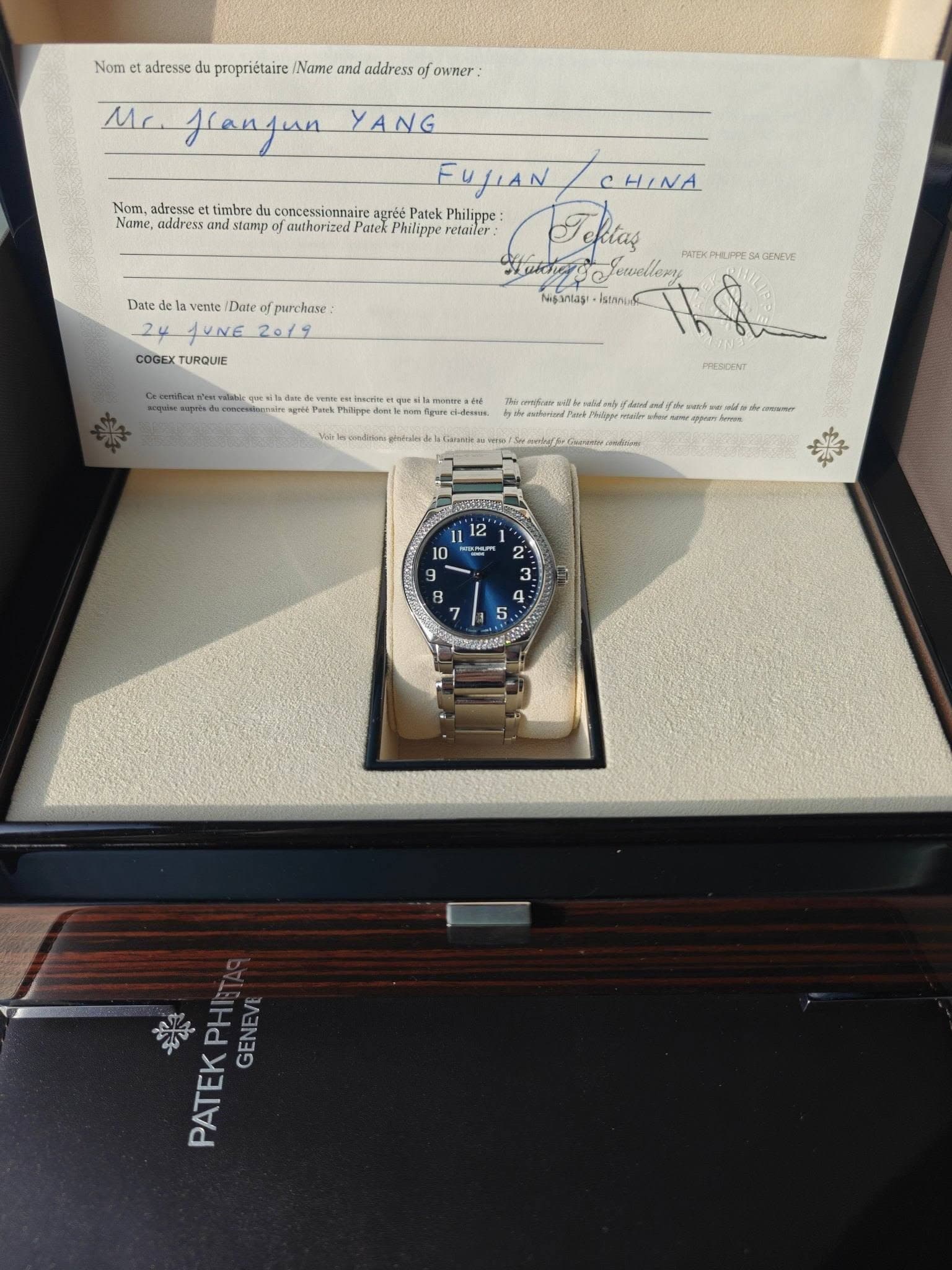May be an image of wrist watch and text