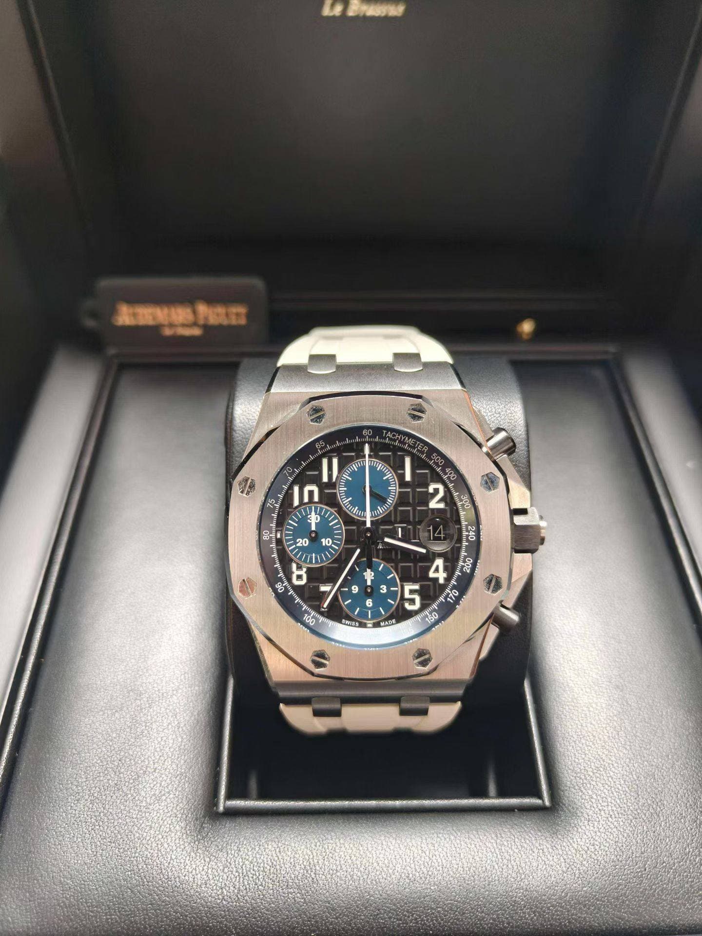 May be an image of wrist watch and text