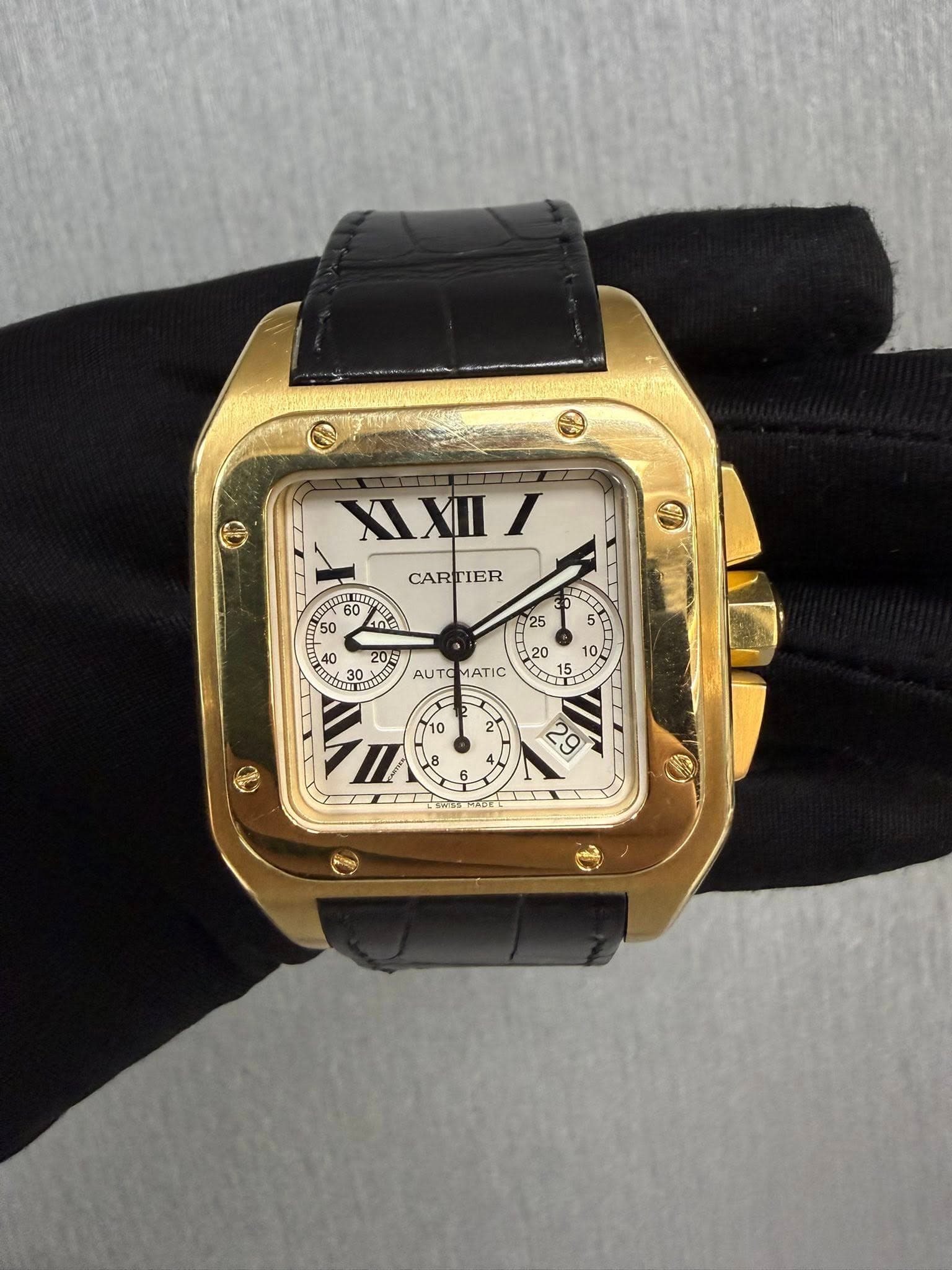 May be an image of wrist watch and text that says 'XXII/ I ٢ HET 60 50 50 CARTIER 25 40 20= 京さい 30 30、 표 5 10 0 O 20 AUTO MATIC 10 2 2 I 8 O 6 6 6 29'