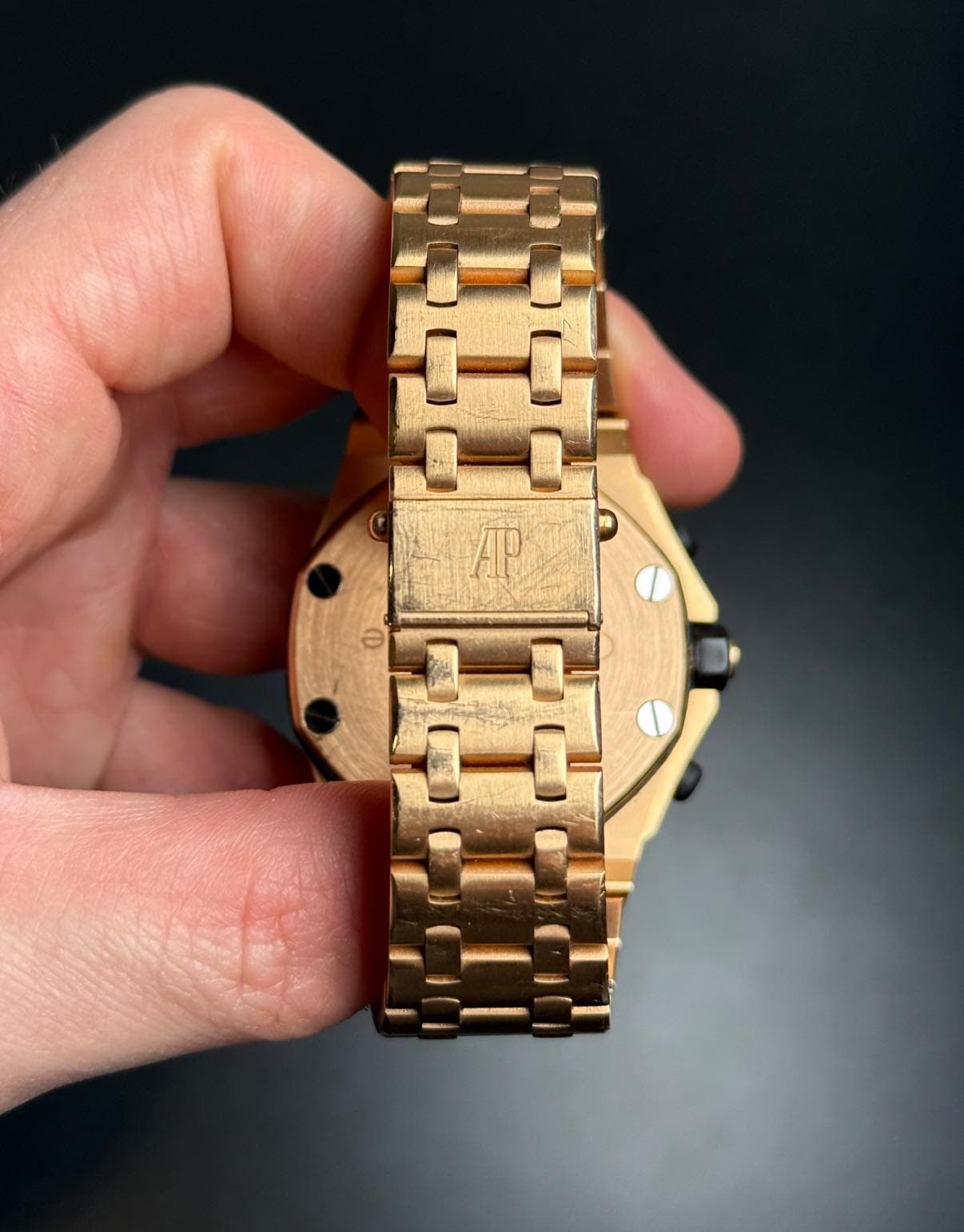 May be an image of wrist watch and text that says 'AP'