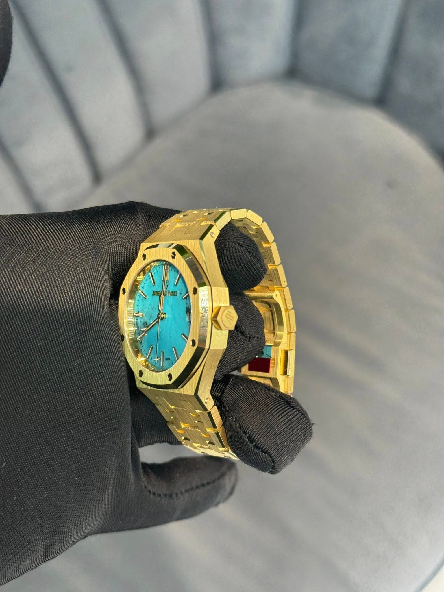 May be an image of digital watch, jewelry and text