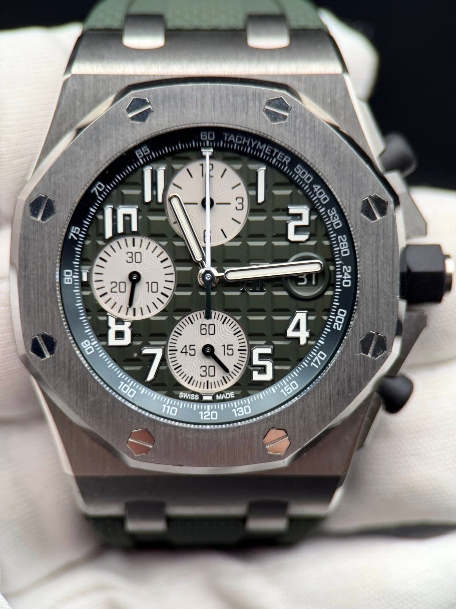 May be an image of wrist watch and text that says '75 ি Il 500 400 เท اة ರ 5 መል 170 100 ERRAUNAE 7 SWISS MADE יישצצ Jneguai 130'