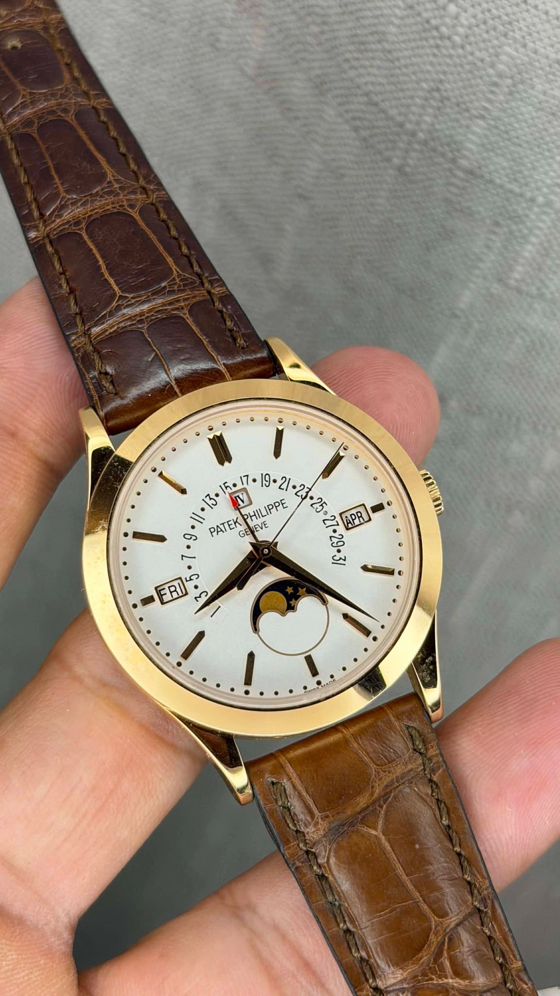 May be an image of wrist watch and text