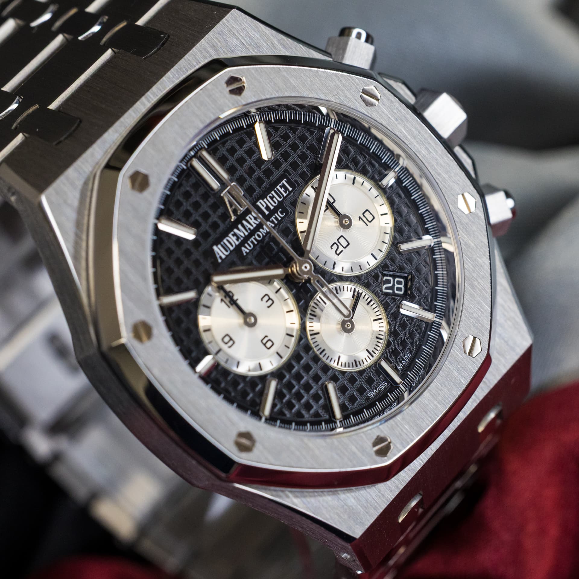May be an image of wrist watch and text