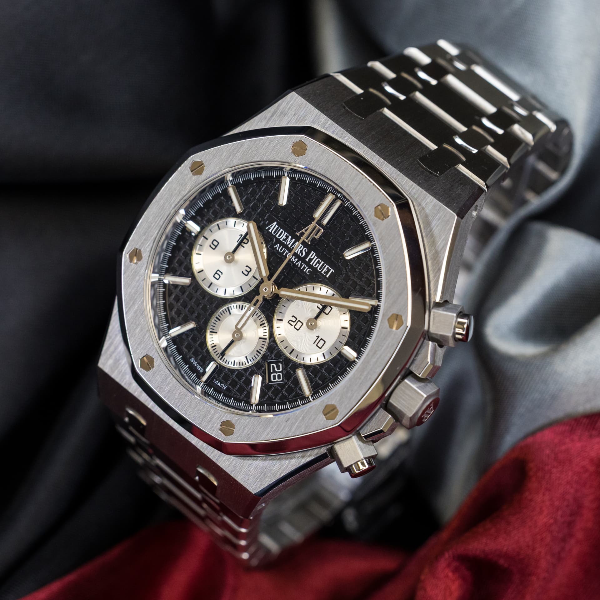 May be an image of wrist watch and text