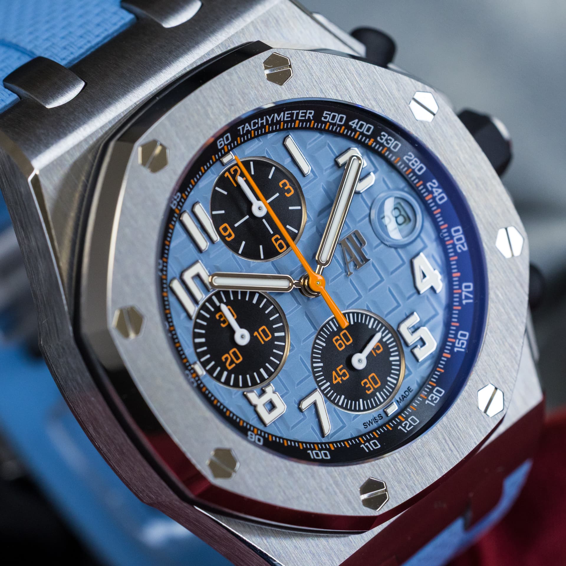 May be an image of wrist watch and text