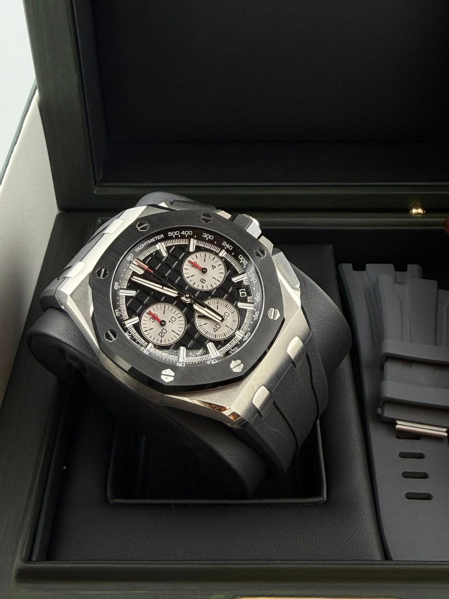 May be an image of wrist watch and text