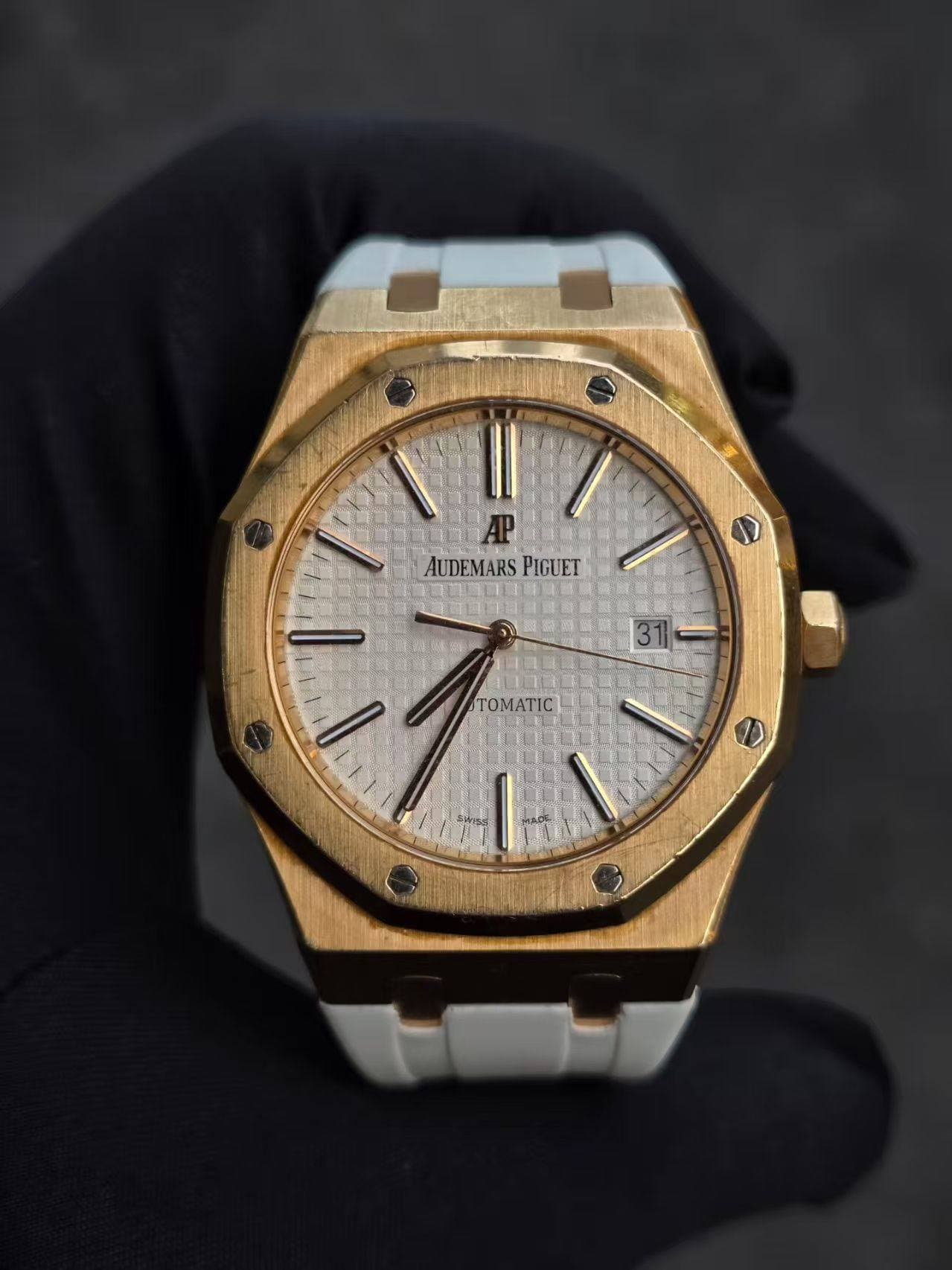 May be an image of wrist watch and text