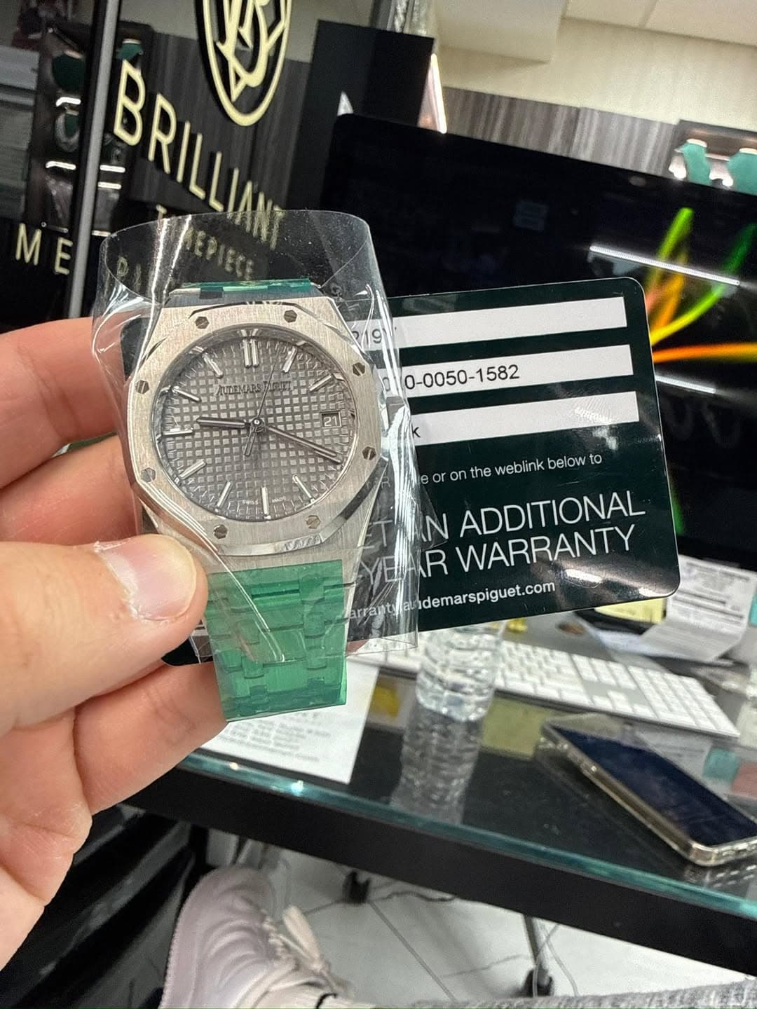 May be an image of wrist watch and text that says 'ME M BRILLIAN BRILIG 11 GESREEEE 集藤皮品品 8c or the weblink weblinkbelow below to IN ADDITIONAL R WARRANTY arrantya…