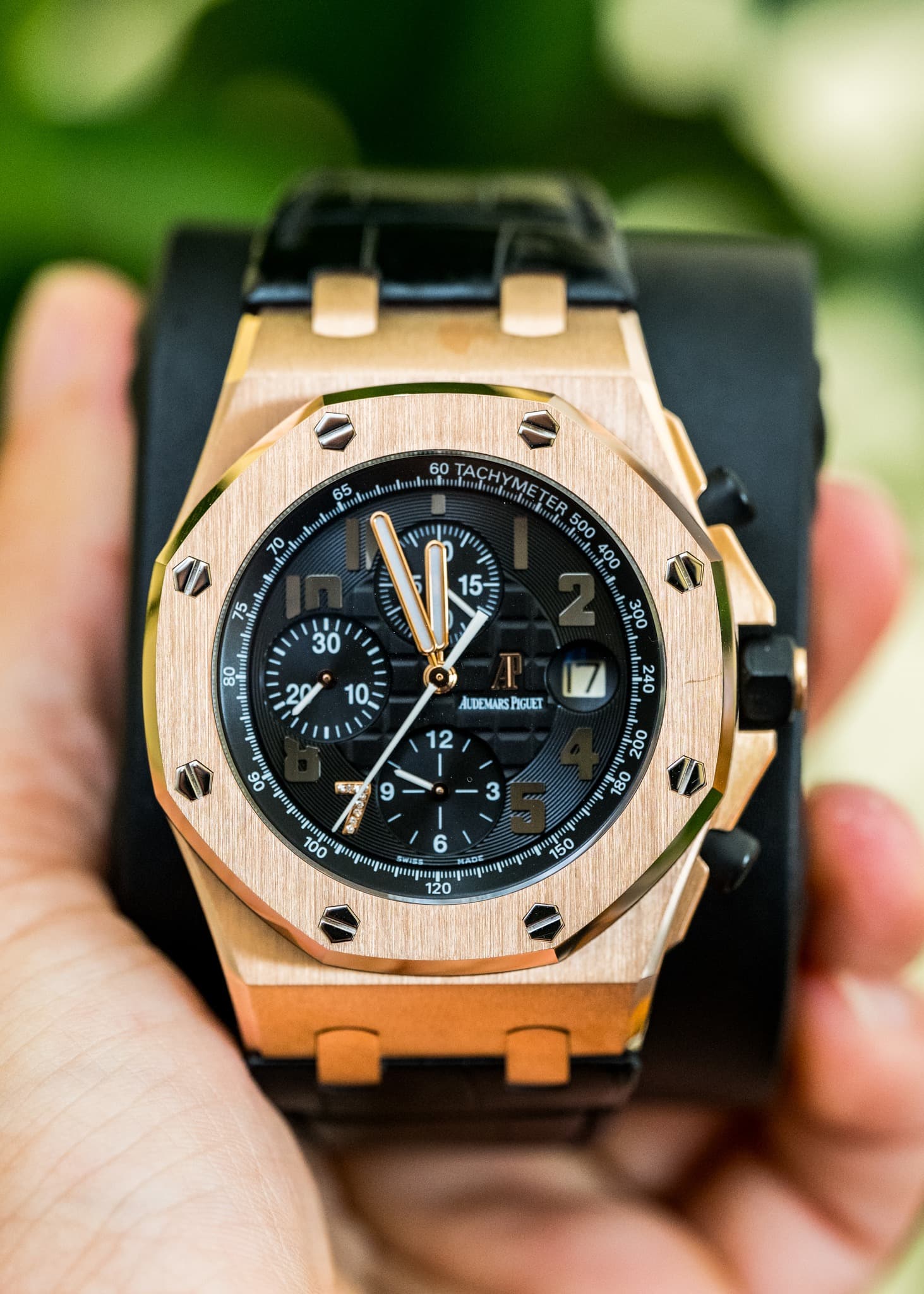 May be an image of wrist watch and text