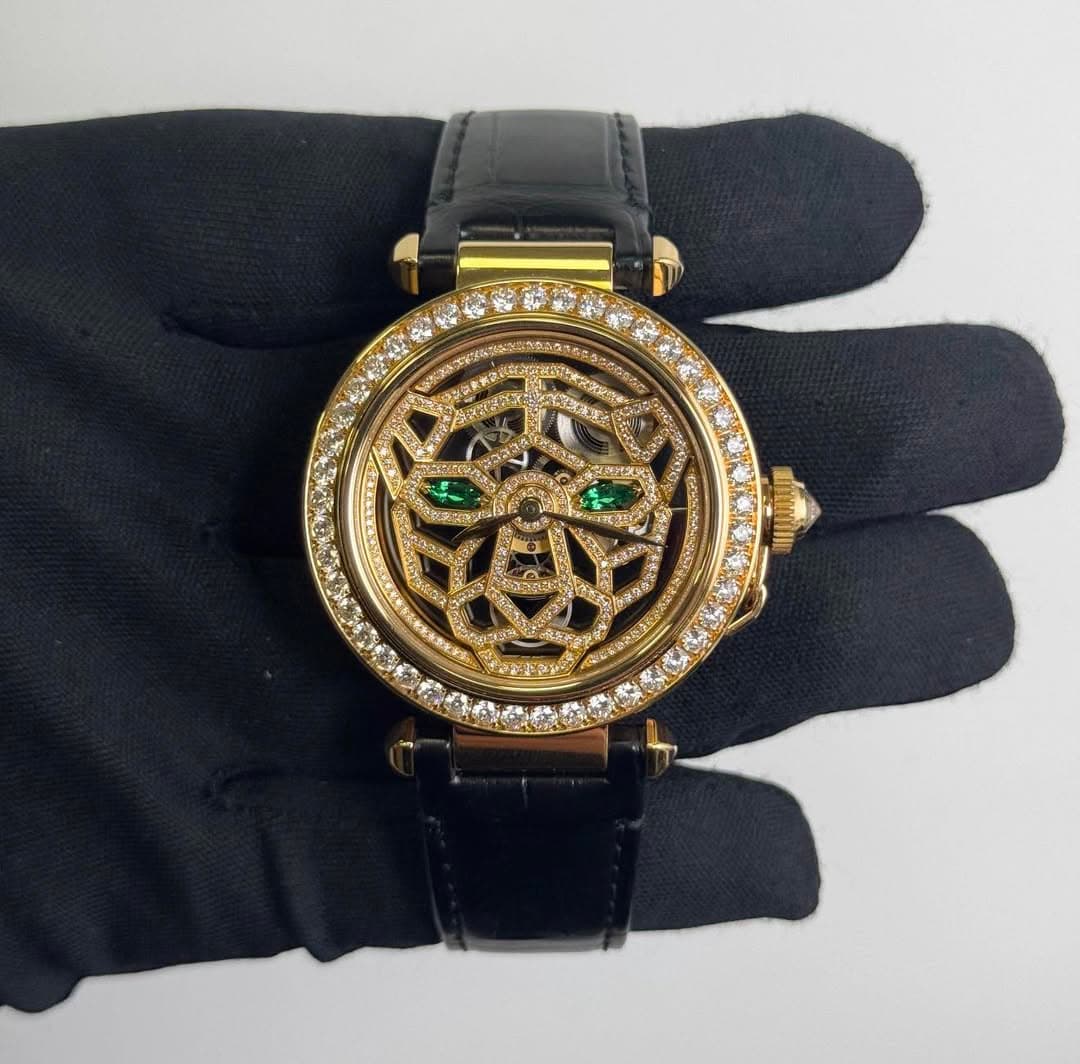 May be an image of wrist watch and jewelry