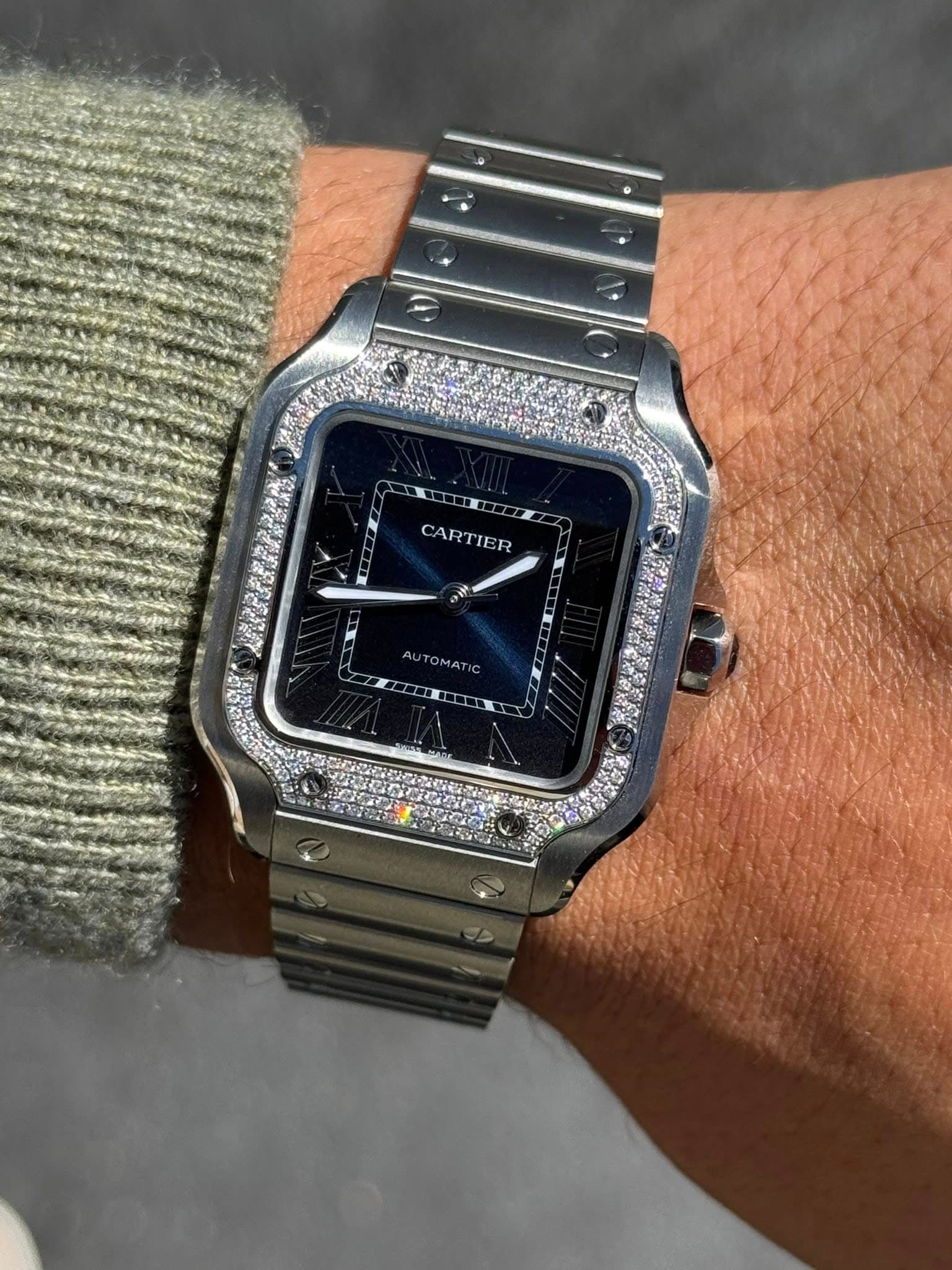 May be an image of digital watch and text that says 'CARTIER CARTIER'