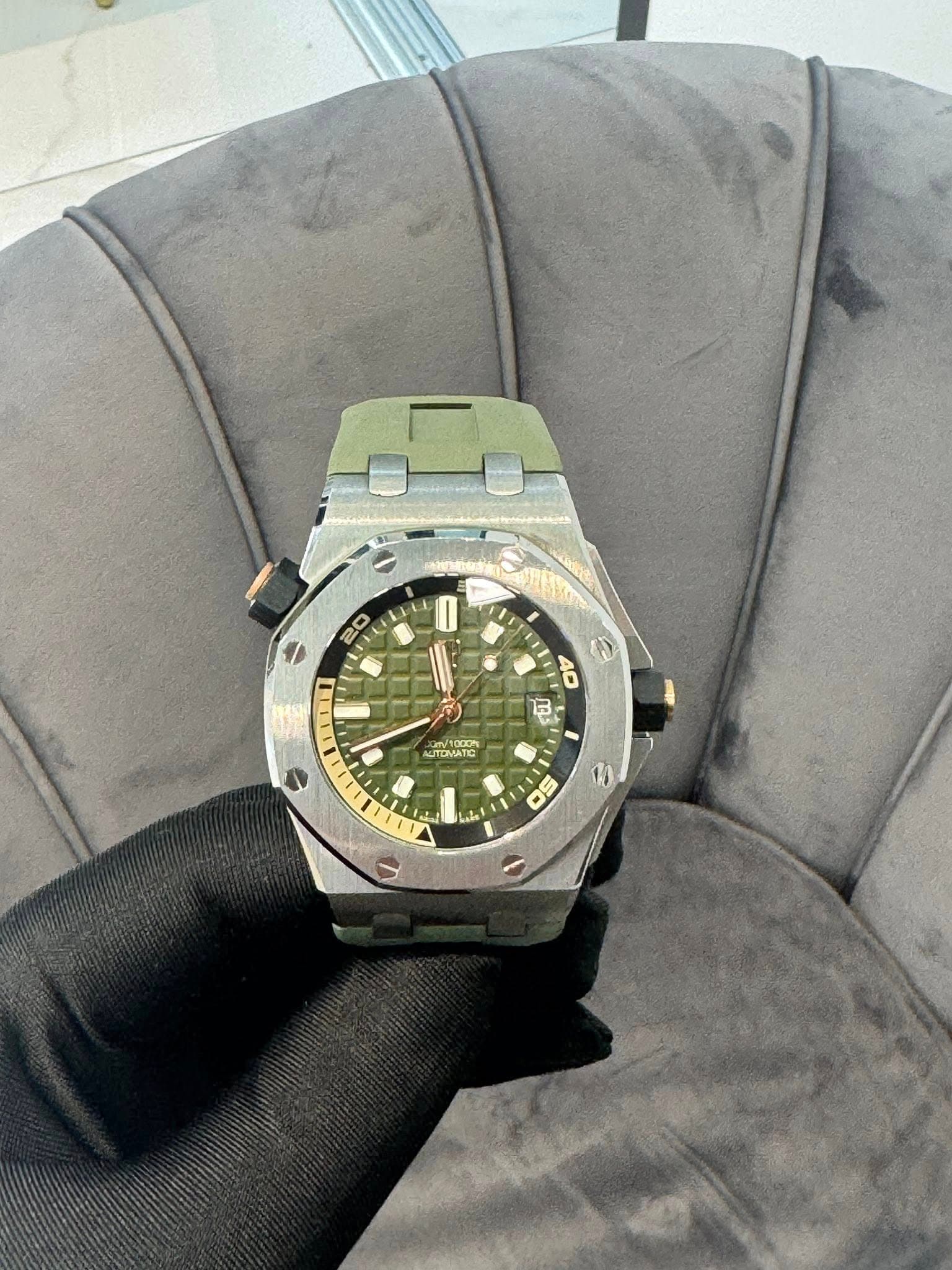 May be an image of wrist watch and text