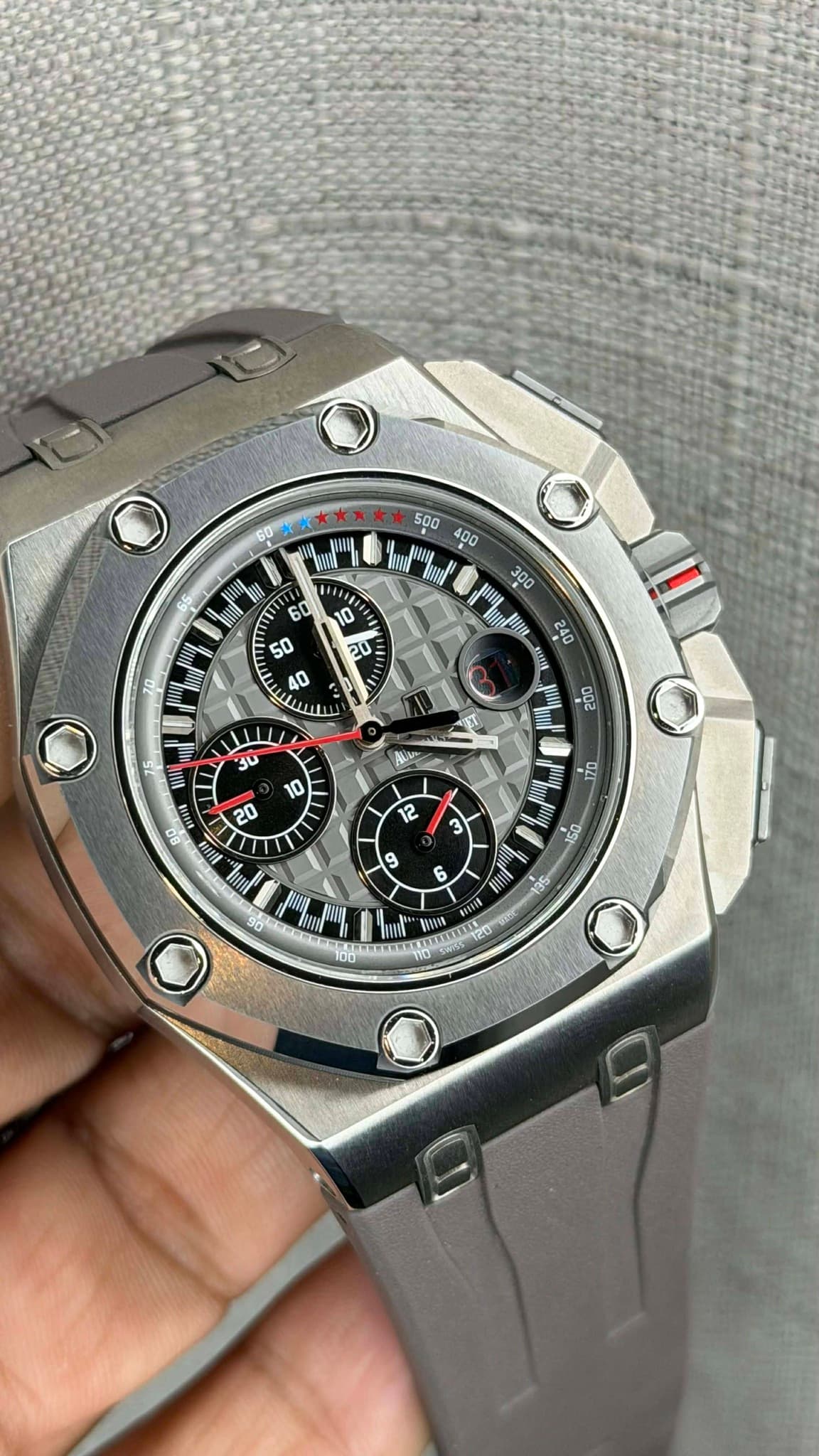 May be an image of wrist watch and text