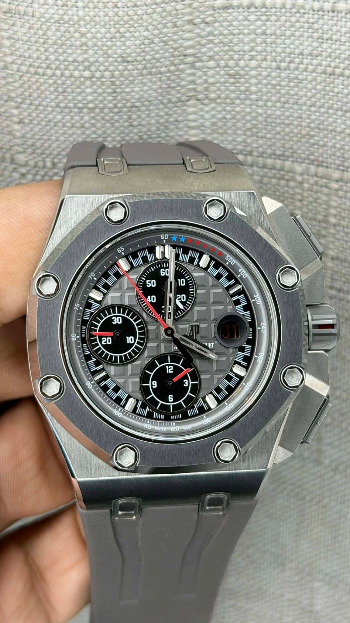 May be an image of wrist watch and text