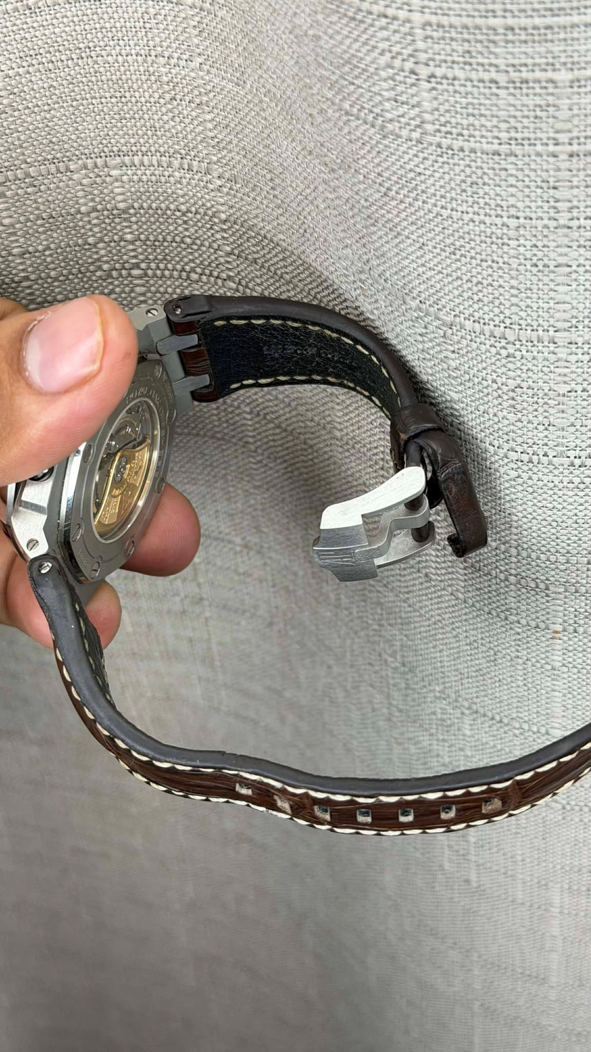 May be an image of leather and digital watch