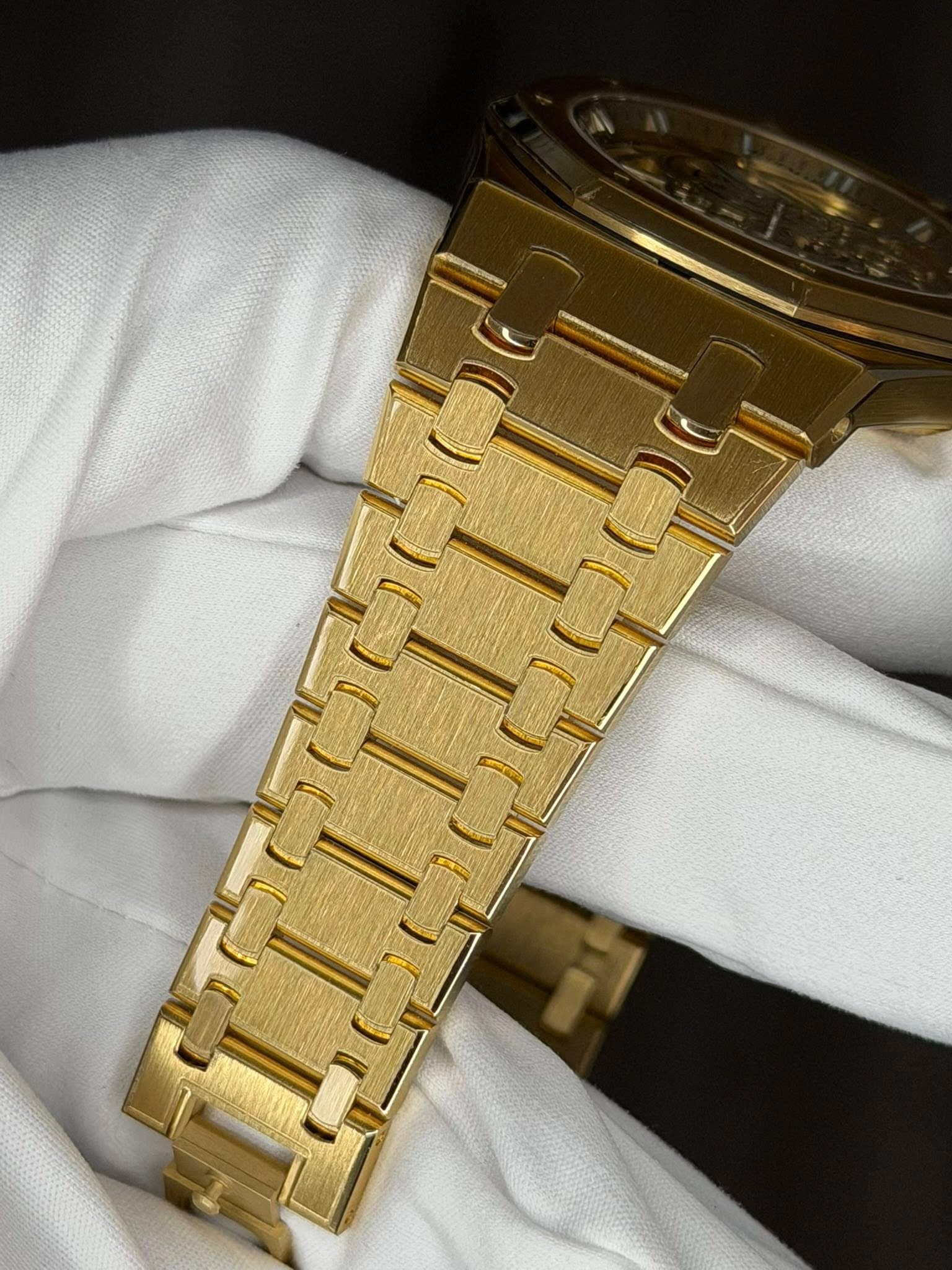 May be an image of wrist watch and text