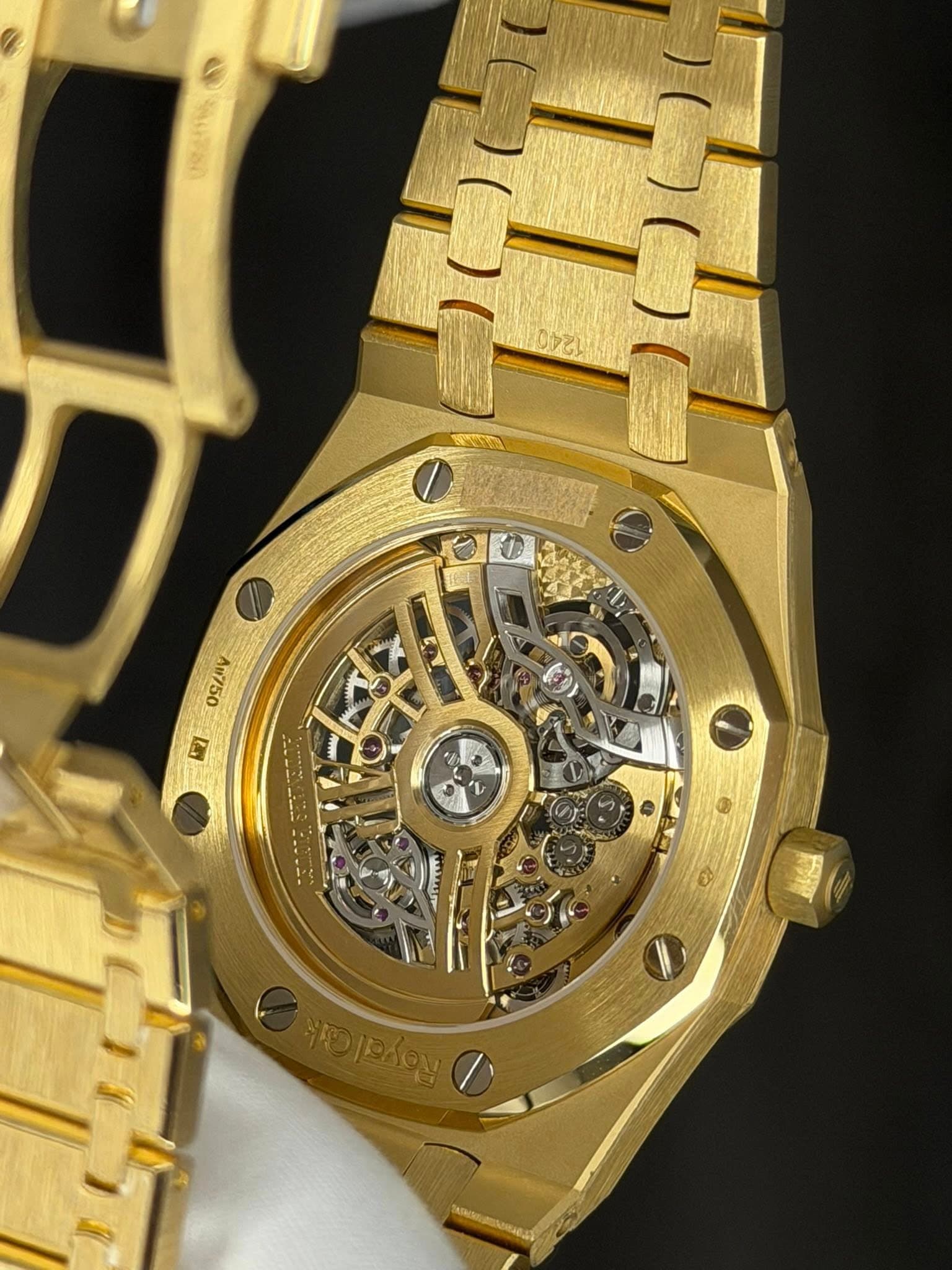 May be an image of wrist watch and text