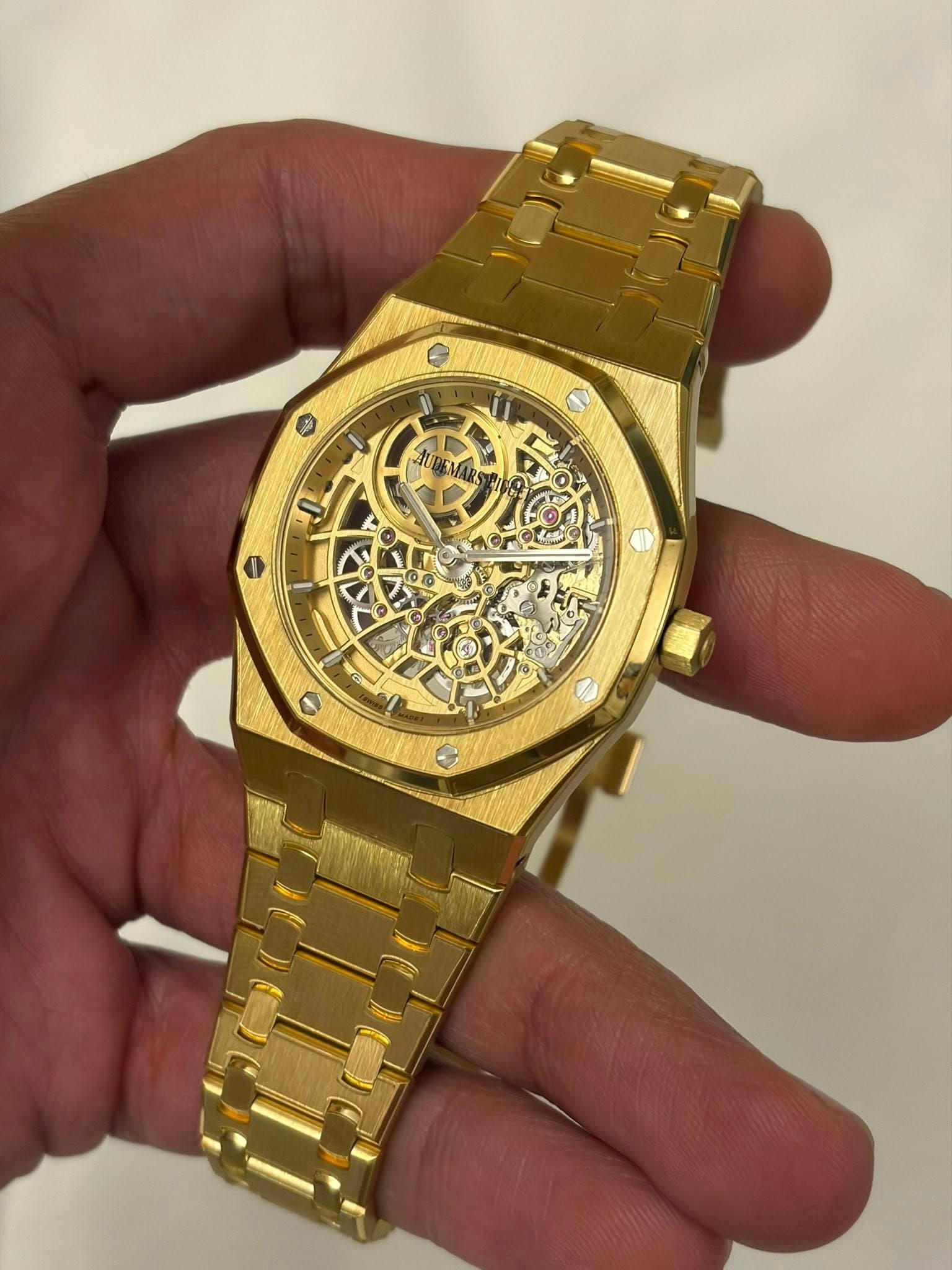 May be an image of wrist watch and text that says 'I'
