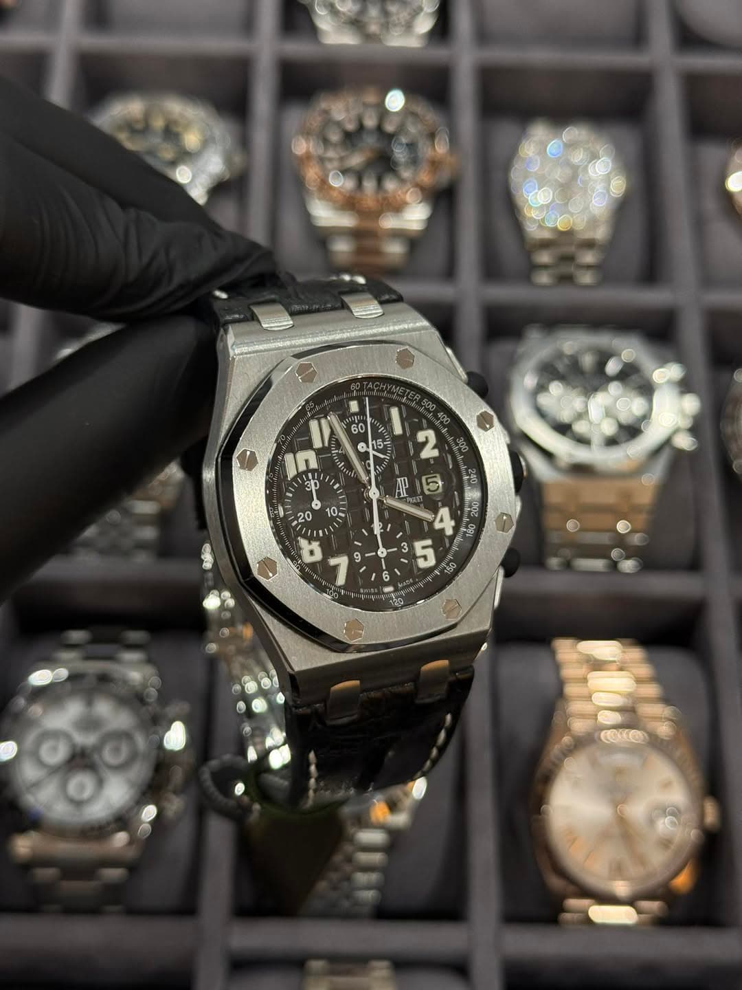 May be an image of wrist watch and text