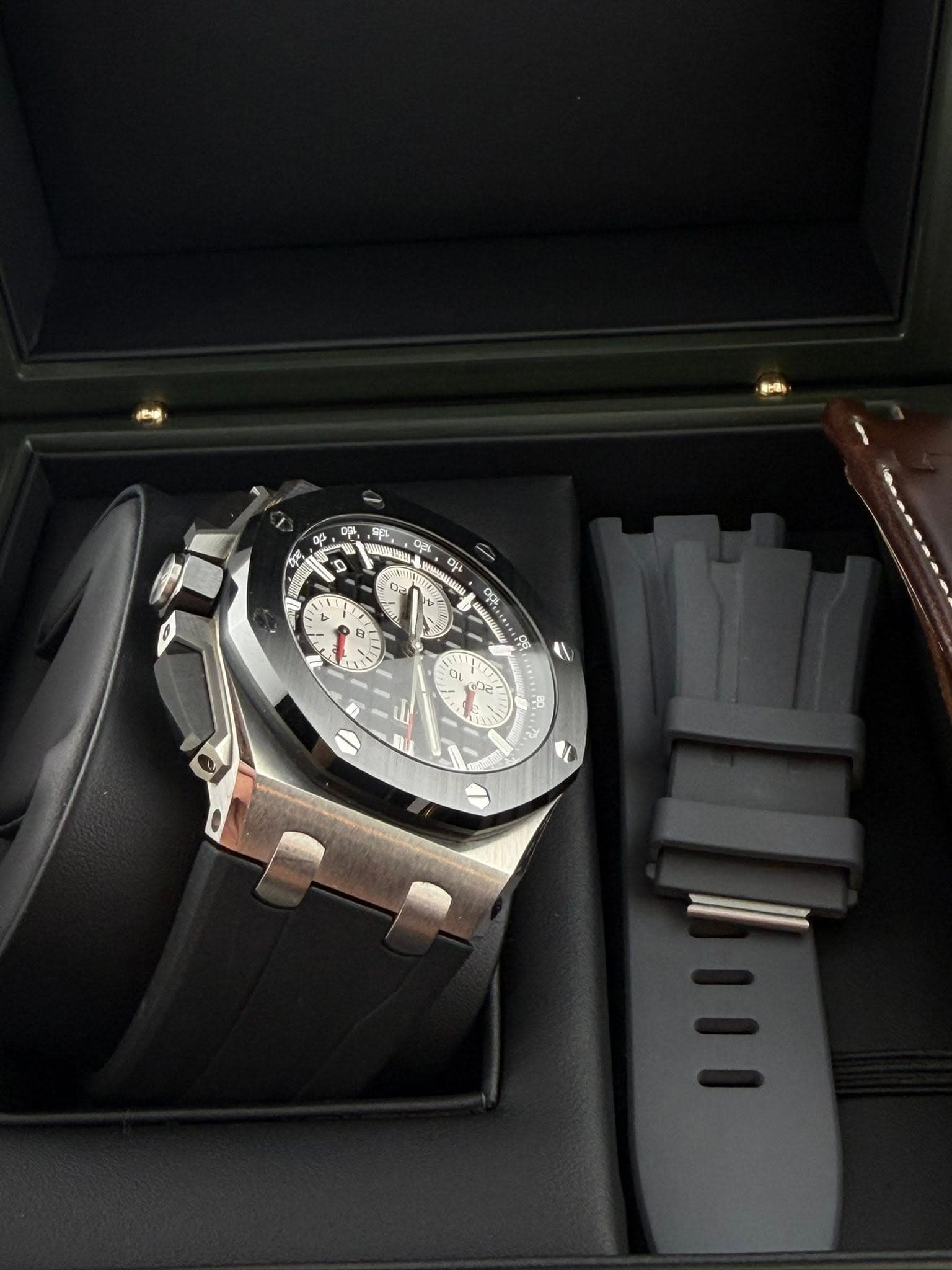 May be an image of wrist watch and text