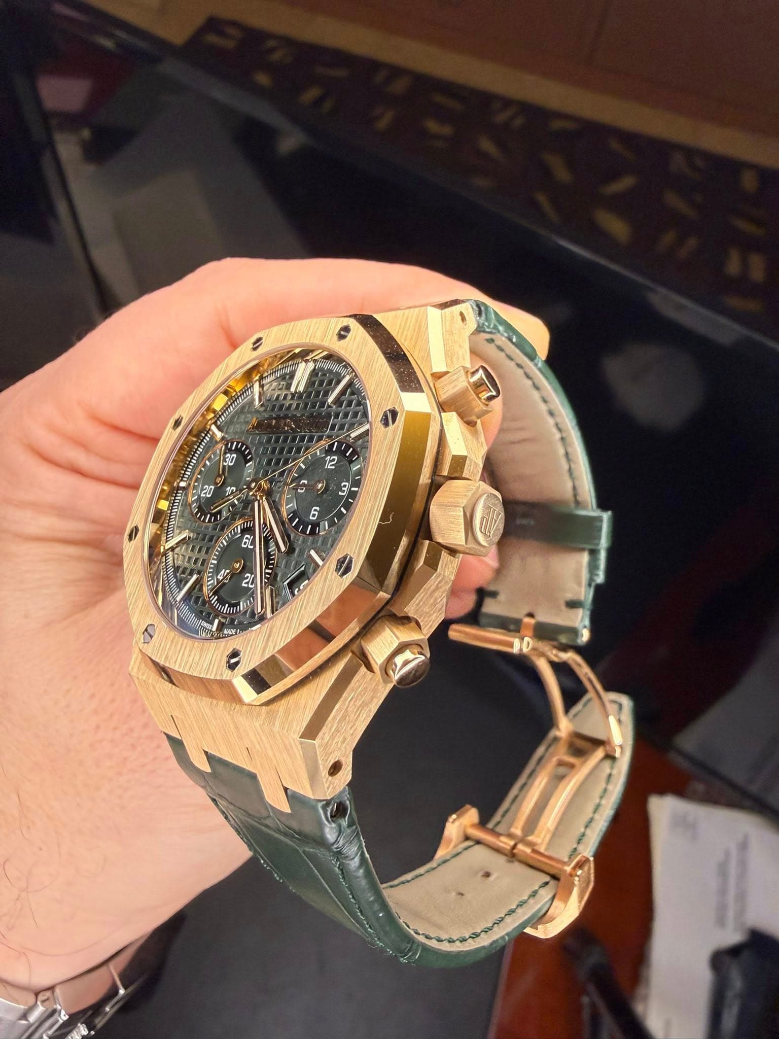 May be an image of wrist watch and text