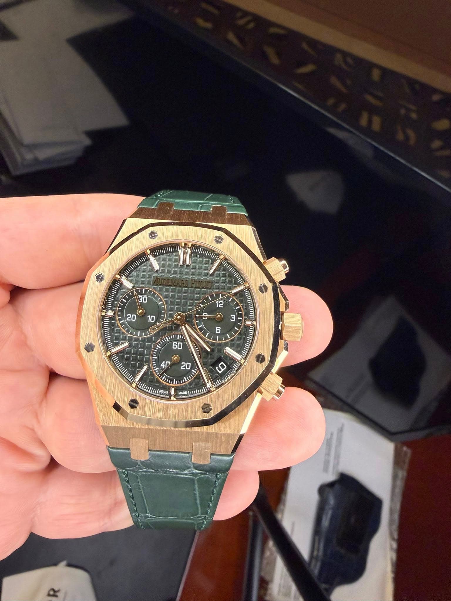 May be an image of wrist watch and text