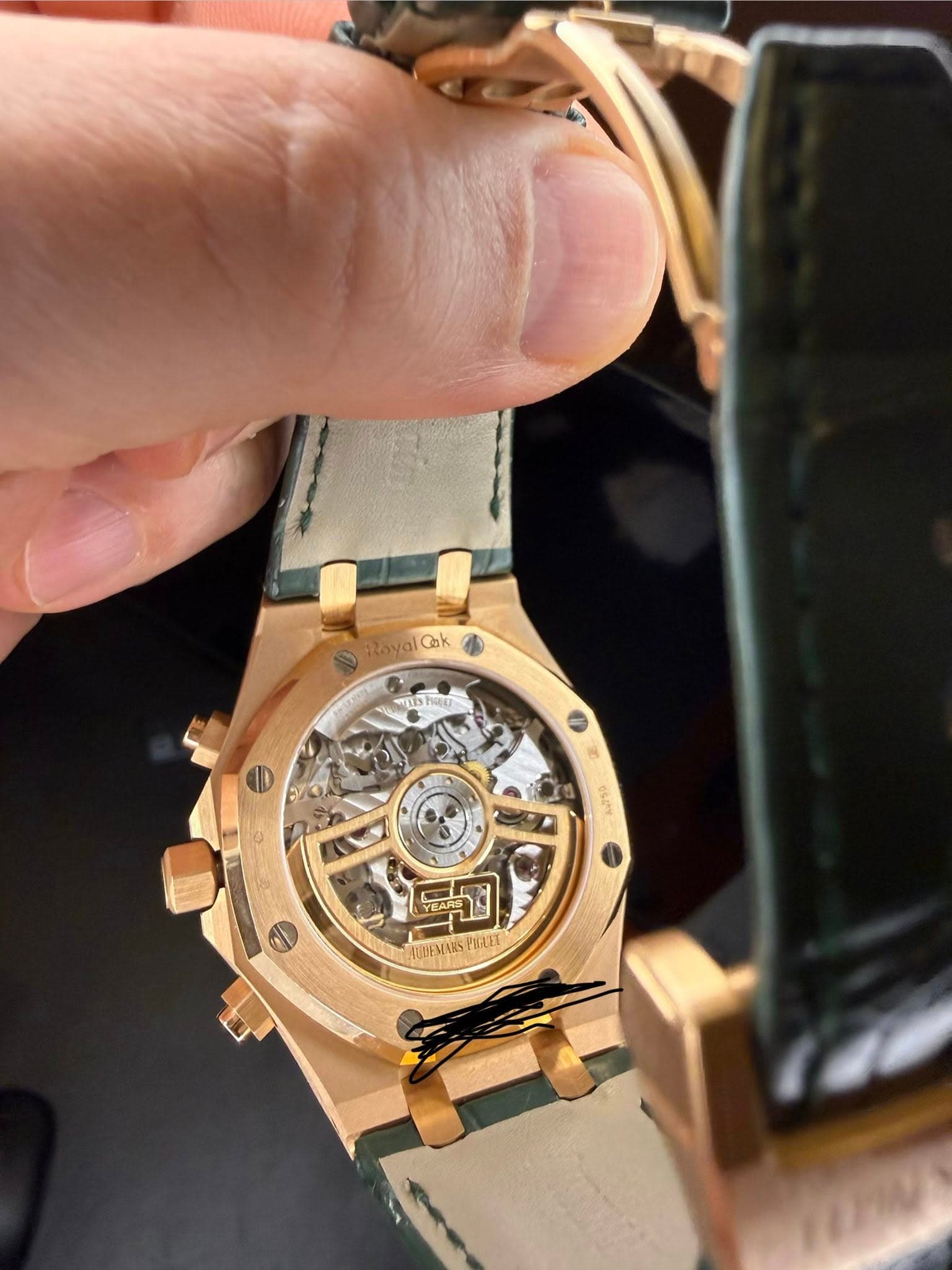 May be an image of wrist watch and text