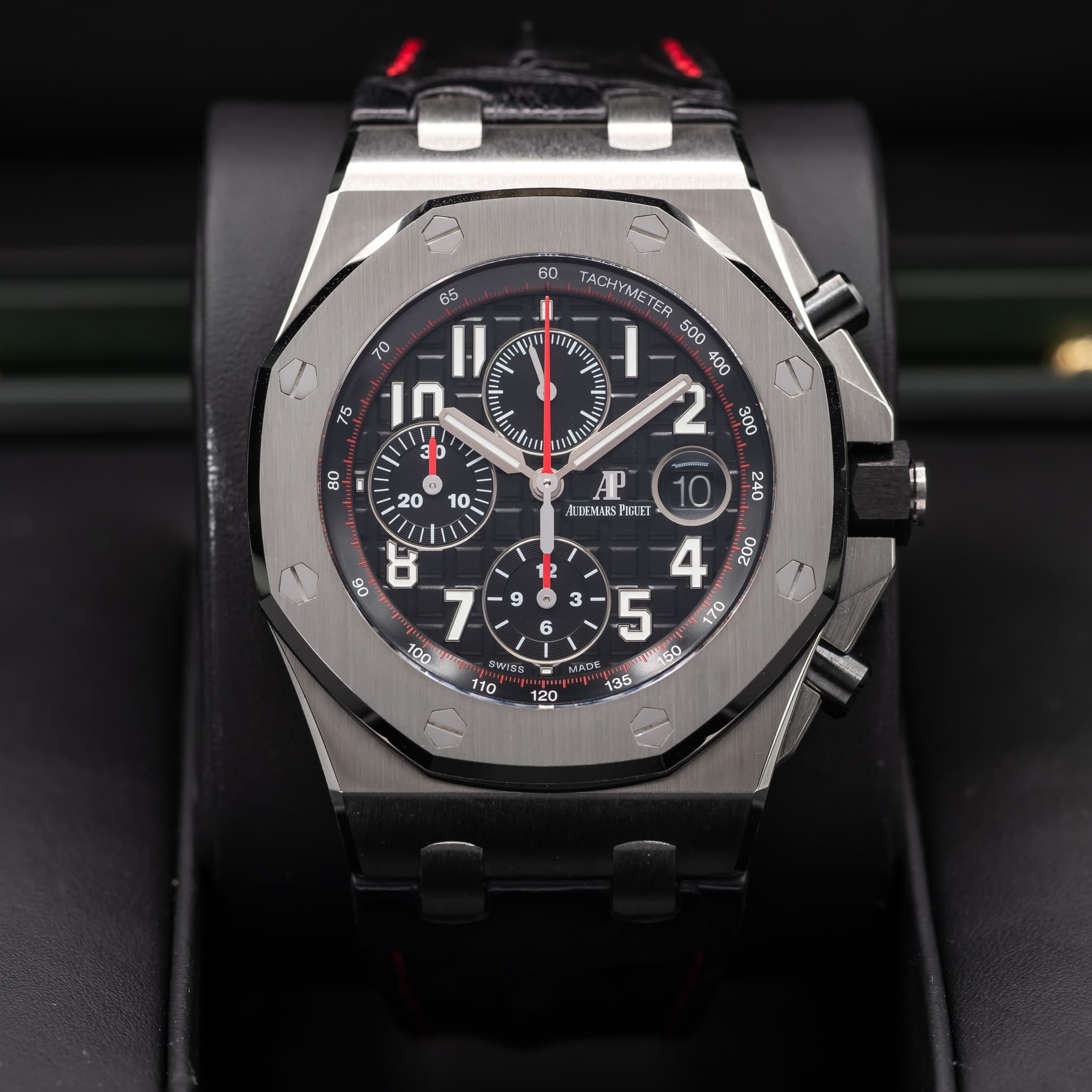 May be an image of wrist watch and text