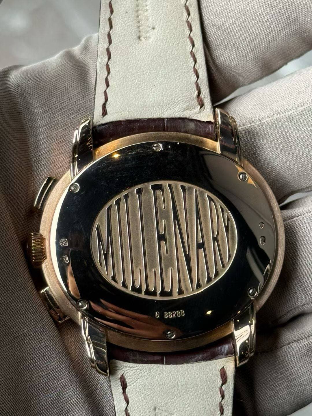 May be an image of wrist watch and text