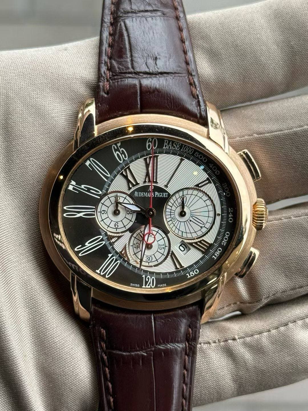 May be an image of wrist watch and text