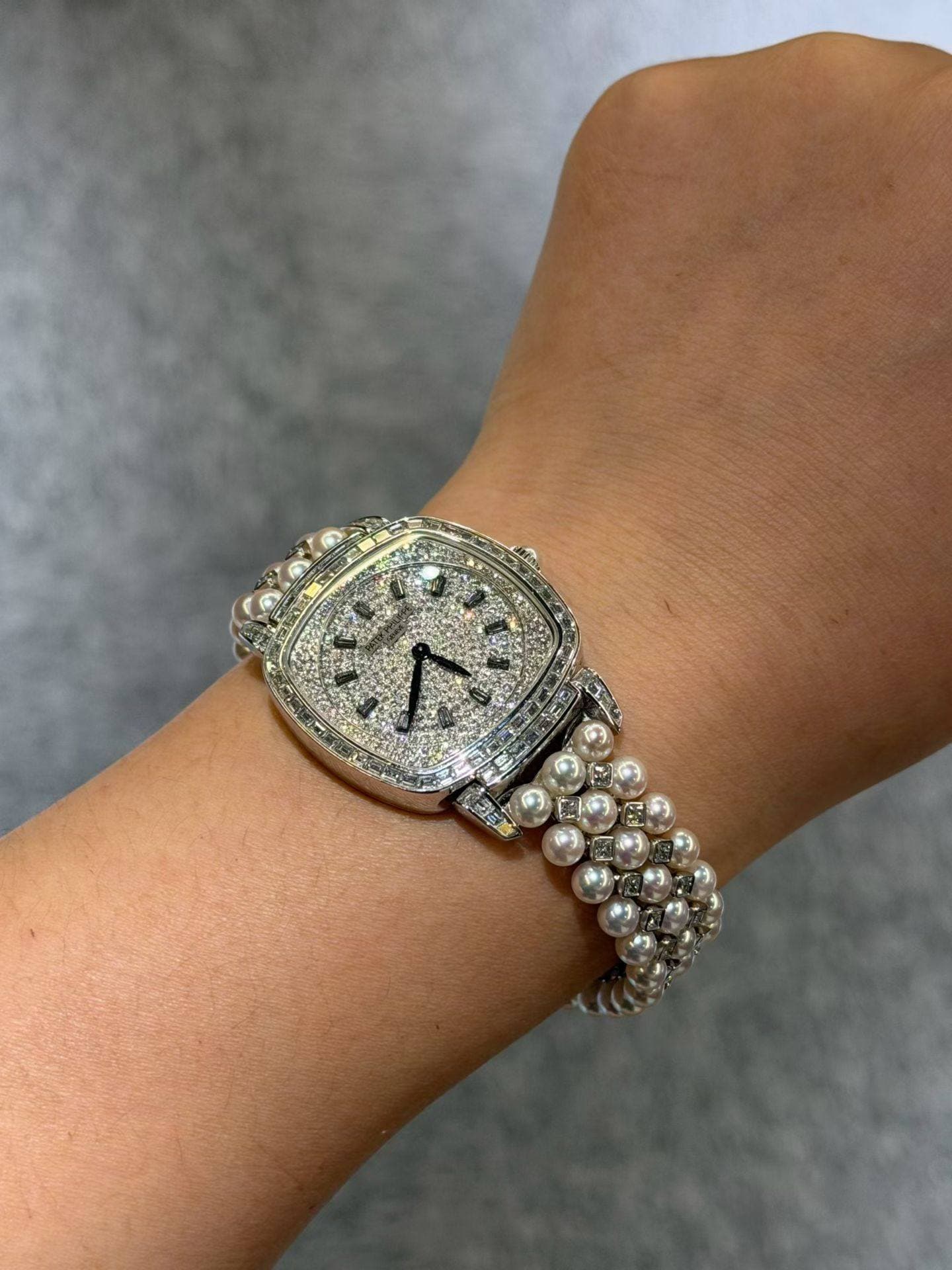 May be an image of jewelry and wrist watch