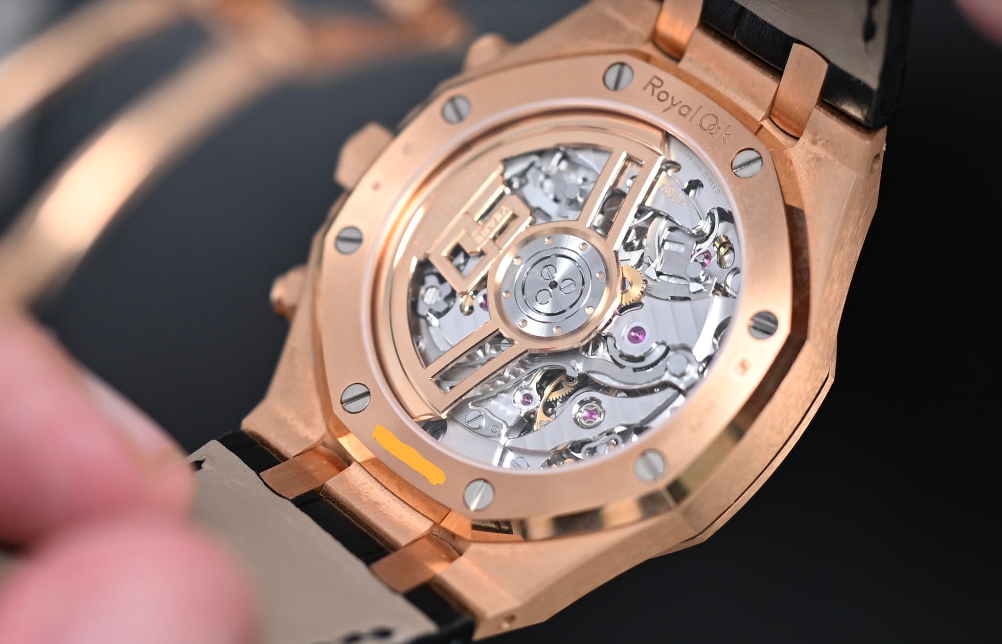 May be an image of wrist watch and text