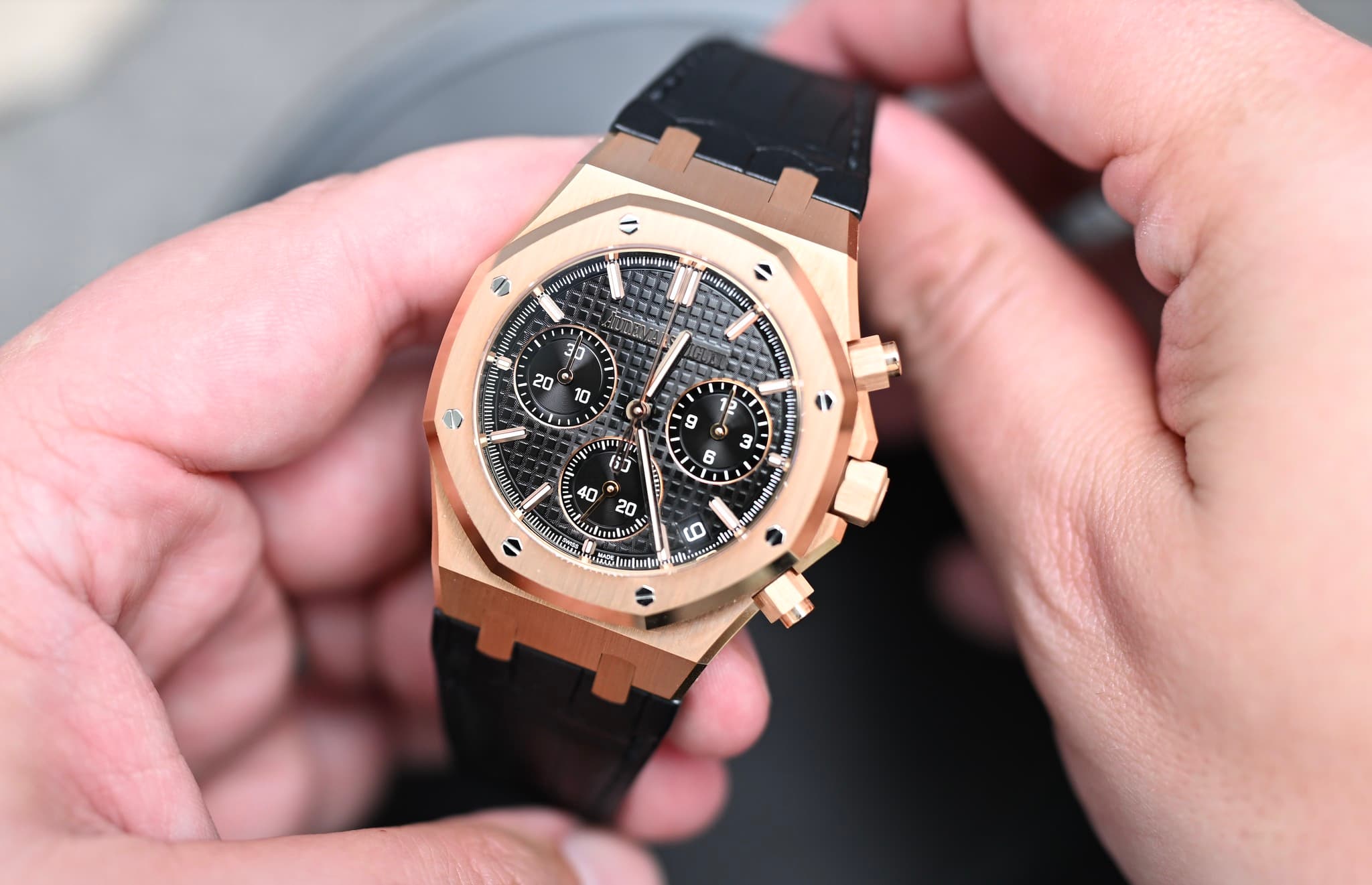 May be an image of wrist watch and text