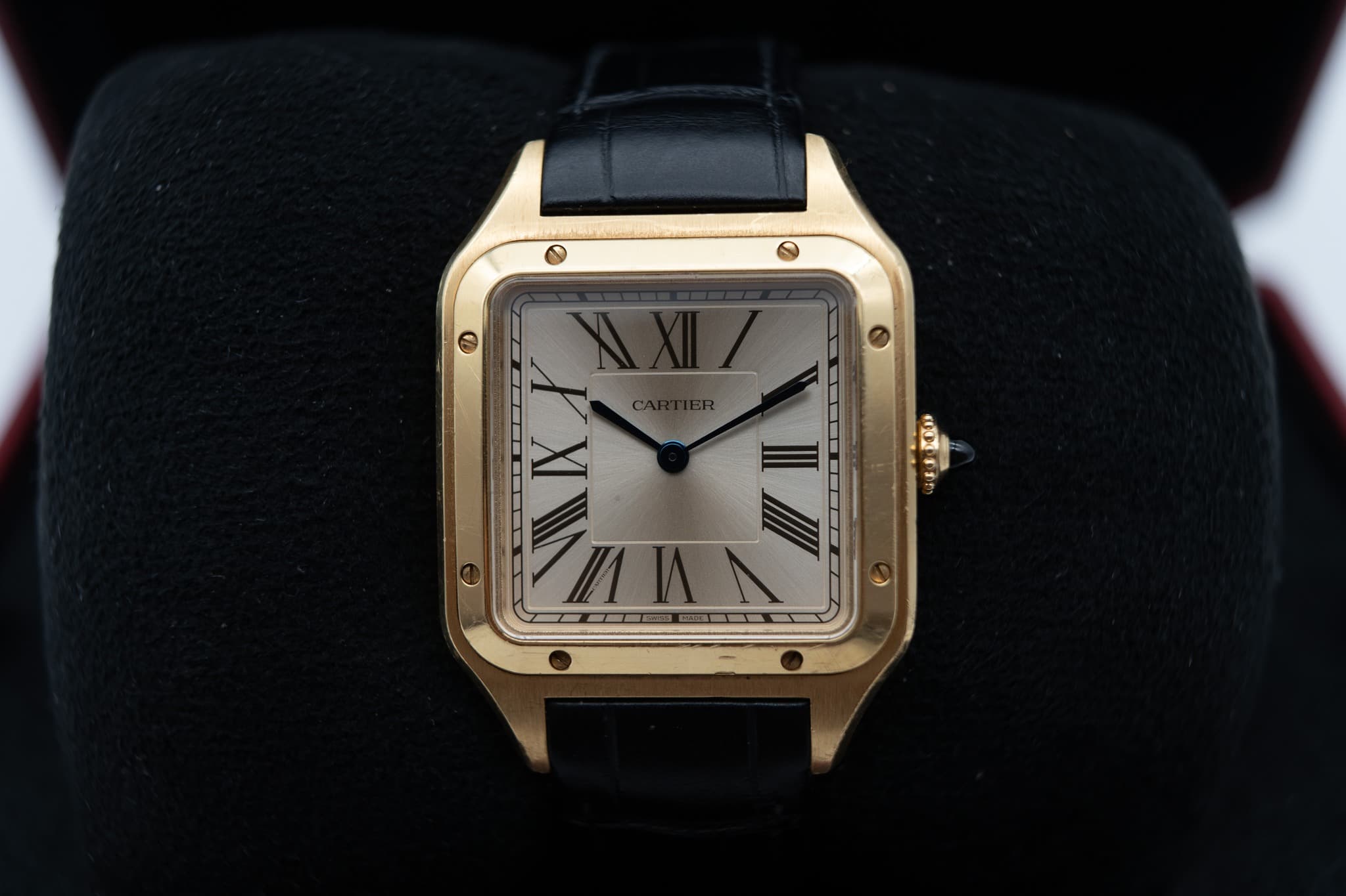 May be an image of wrist watch and text