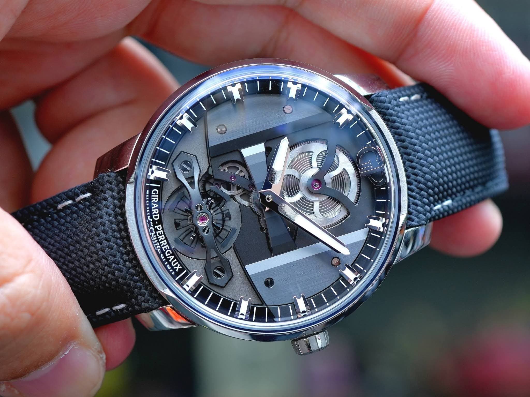 May be an image of wrist watch and text