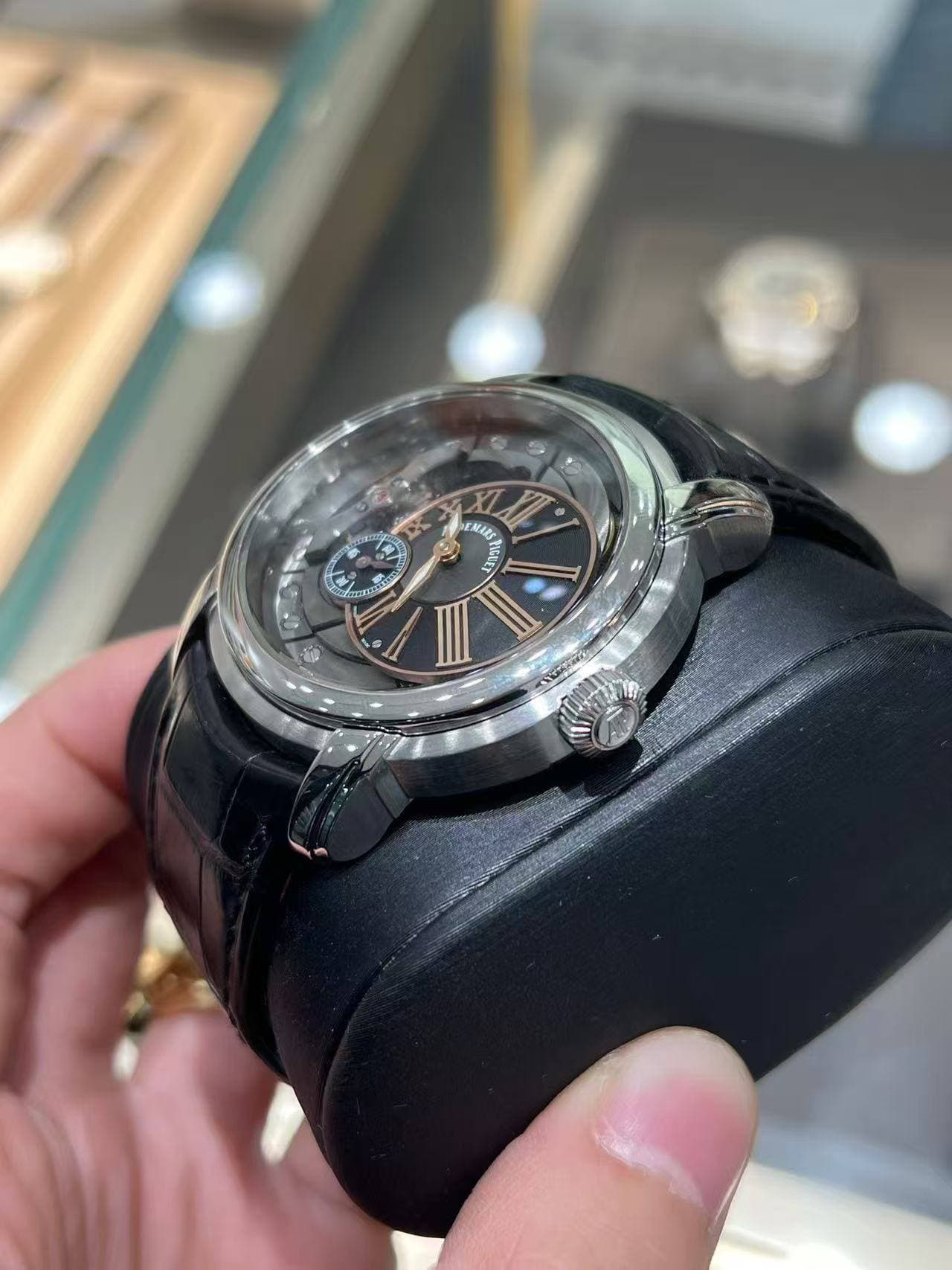 May be an image of wrist watch and text