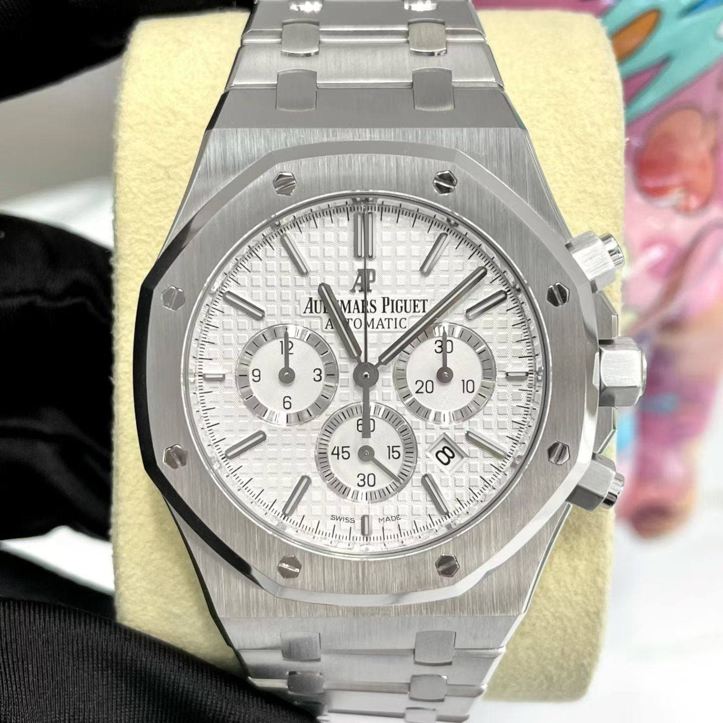 May be an image of wrist watch and text