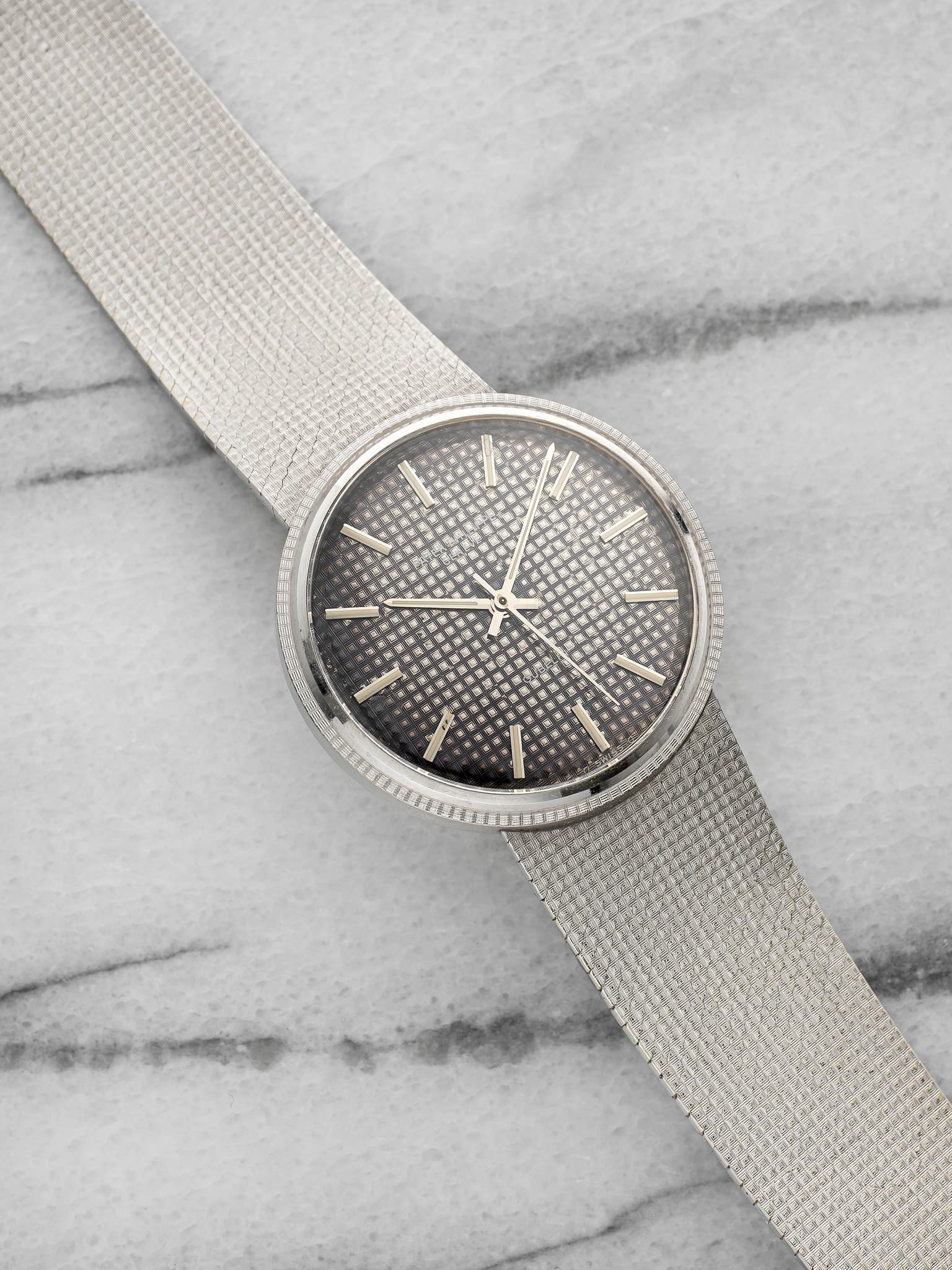 May be an image of wrist watch