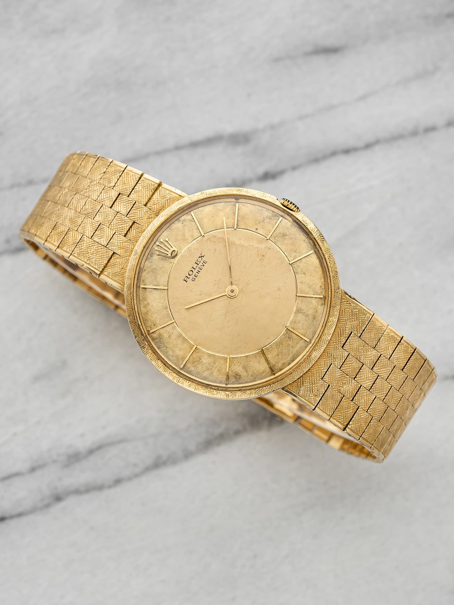 May be an image of jewelry, wrist watch and text