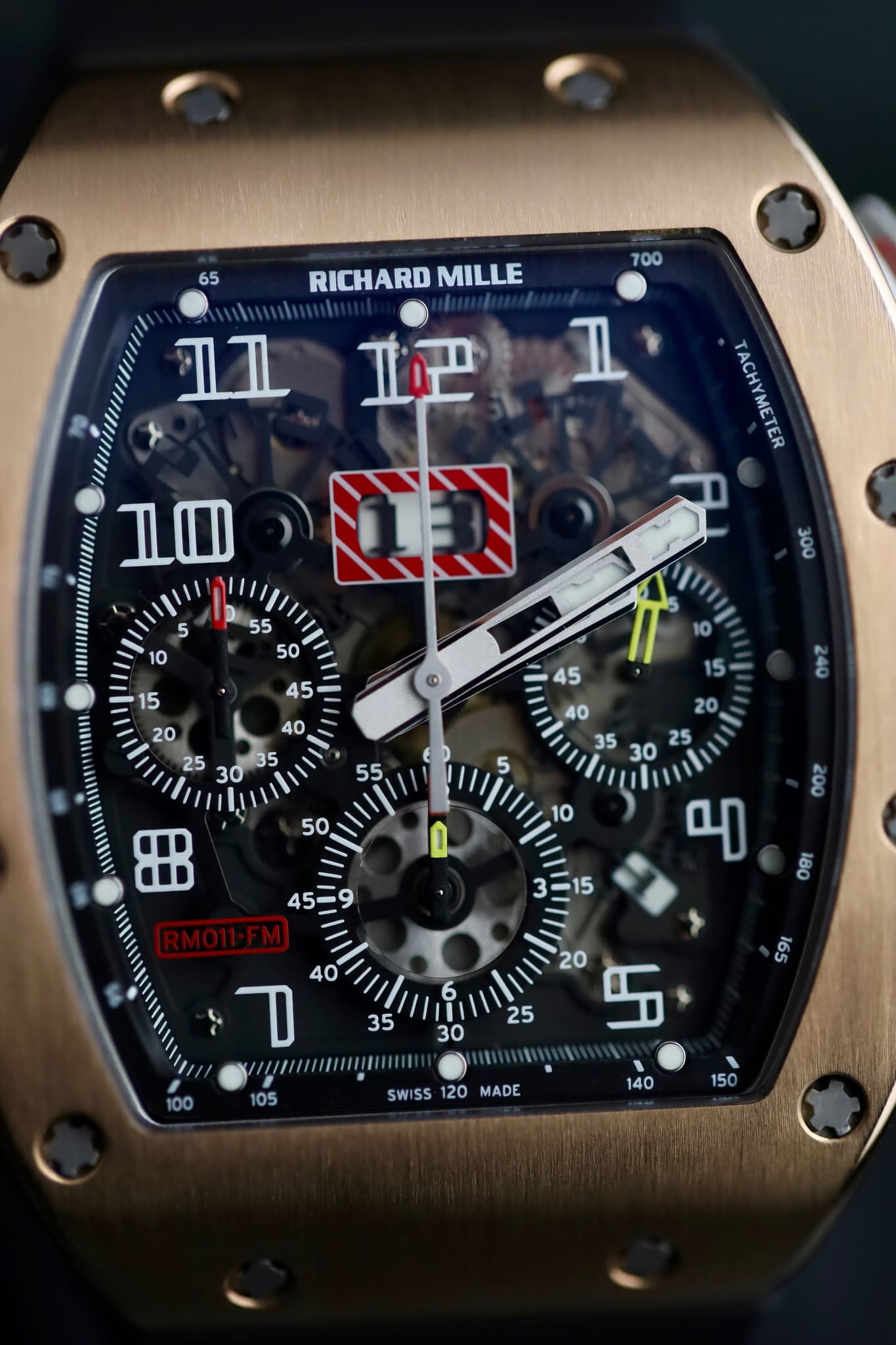 May be an image of wrist watch and text that says '65 RICHARD MILLE 700 II 1卫 I TACHYMETER ER //// שב BB = D y//apиaHuи 105 SWISS SWISS120MADE 120 MADE 140 150'