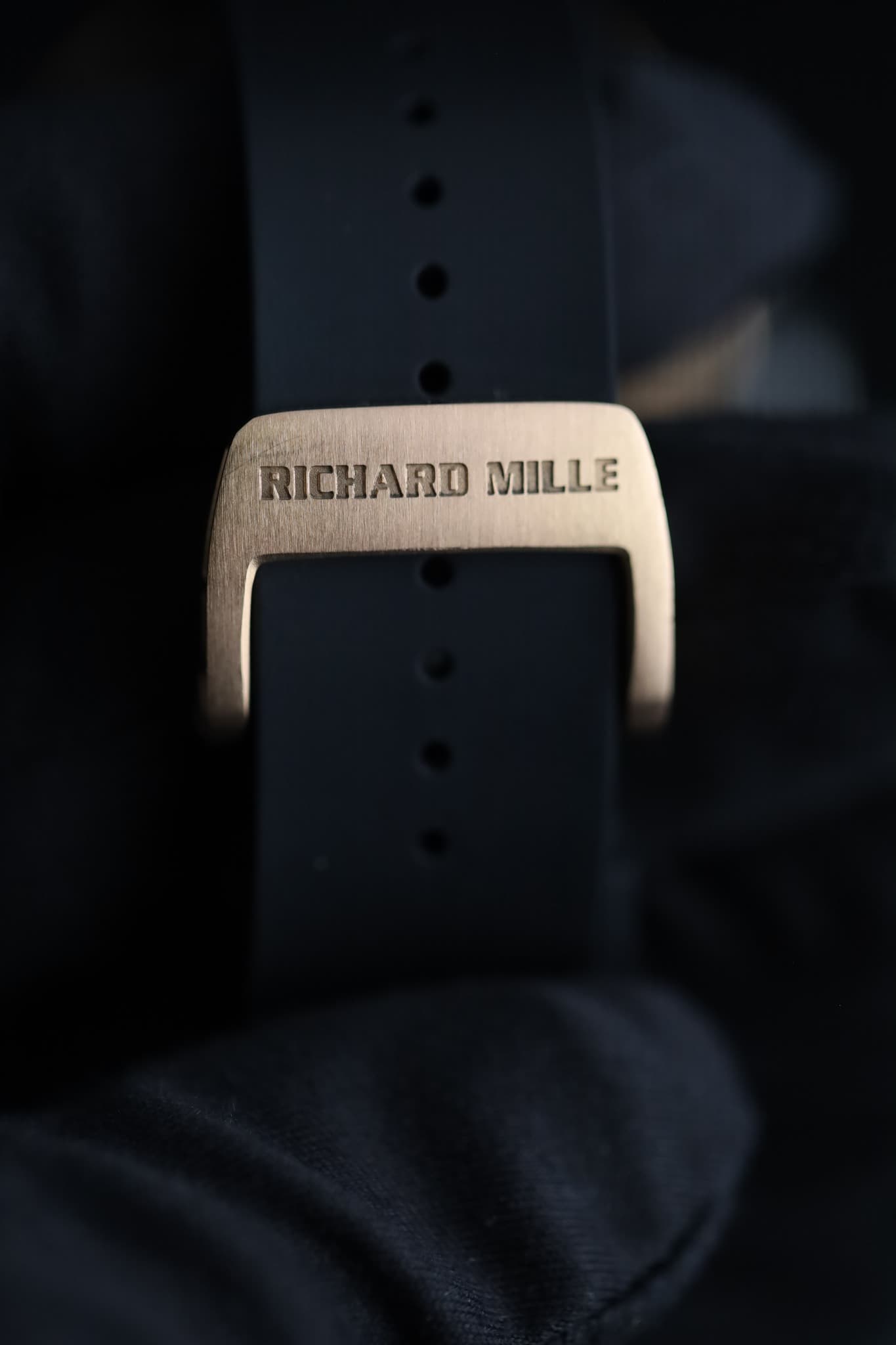 May be an image of leather, digital watch and text that says 'RICHARD RICHARDMILLE MILLE'