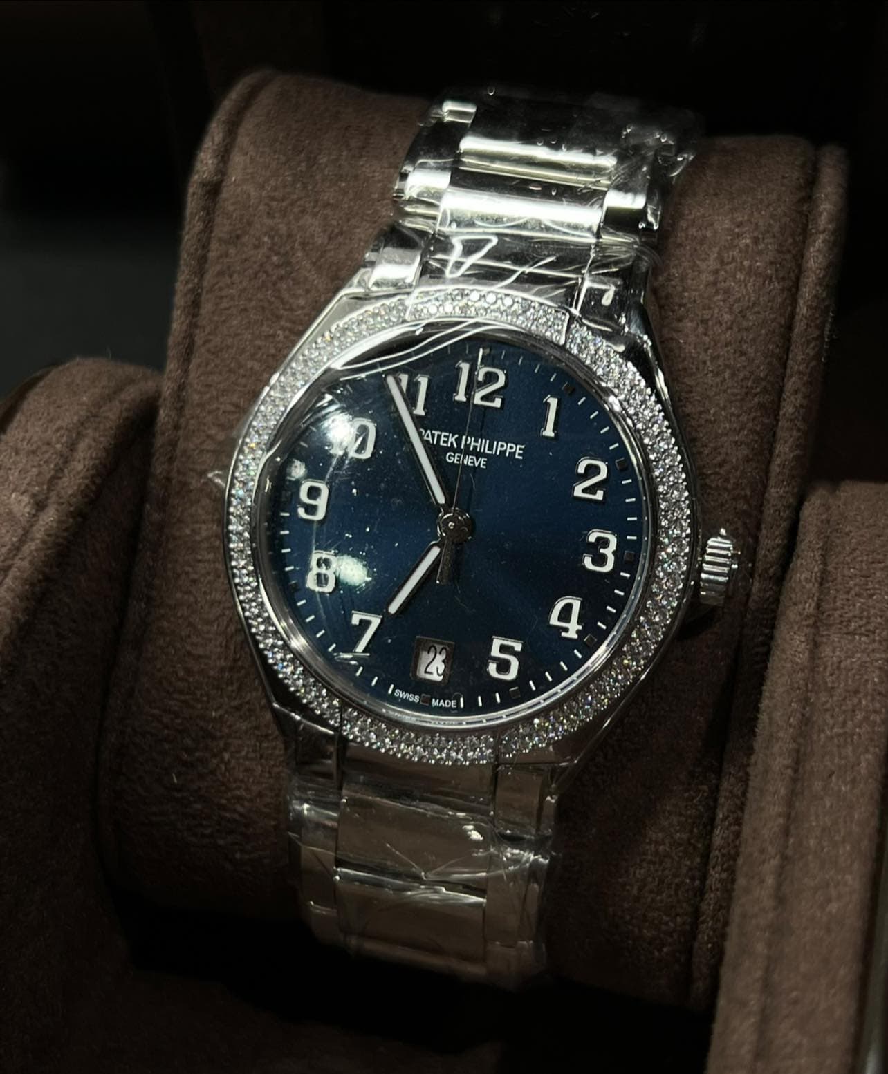 May be an image of wrist watch and text