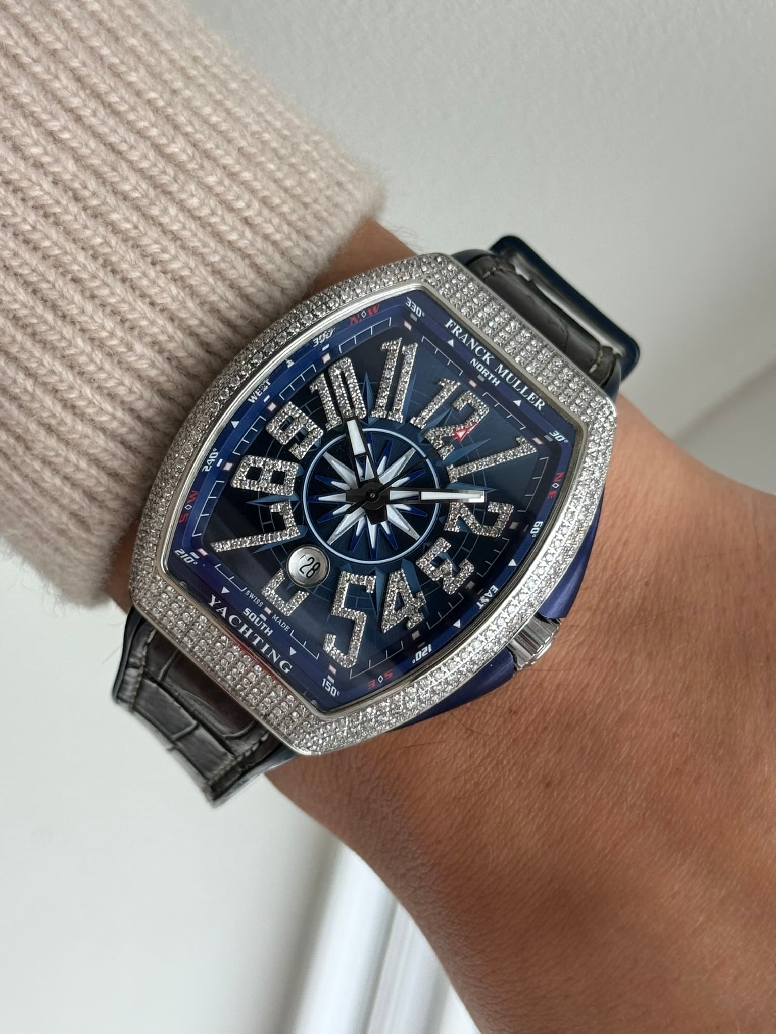 May be an image of wrist watch and text