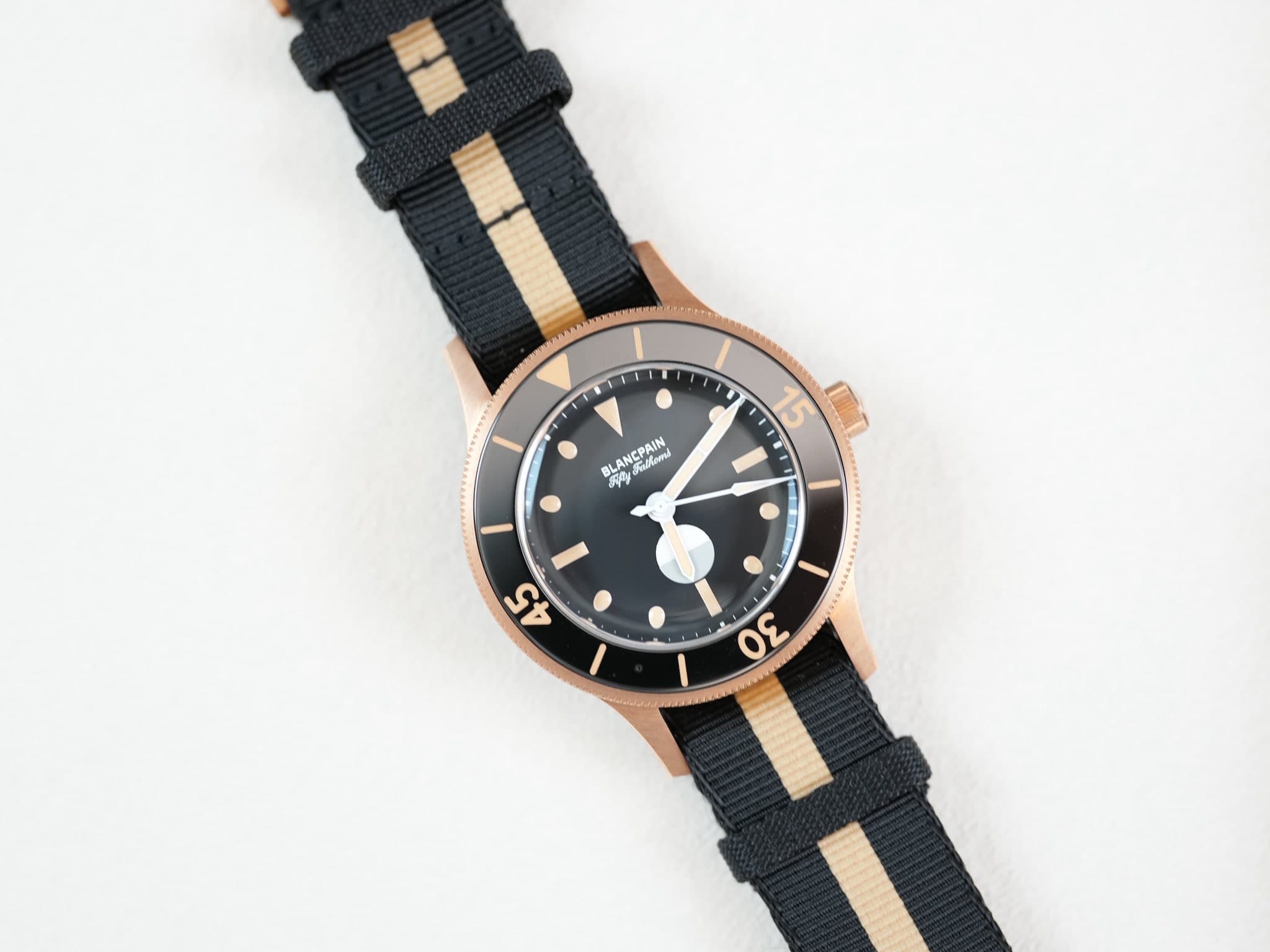 May be an image of wrist watch and text