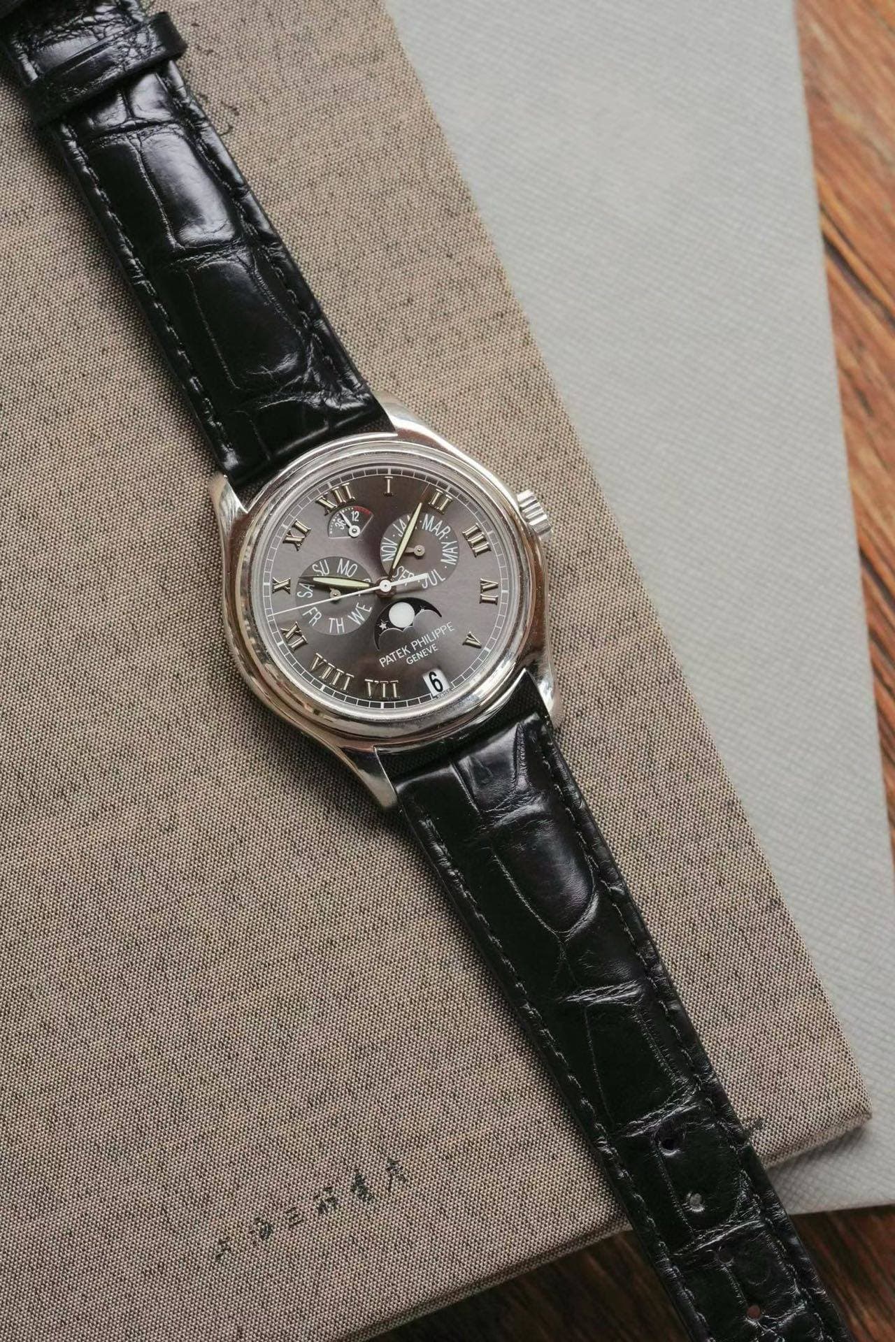 May be an image of wrist watch and text