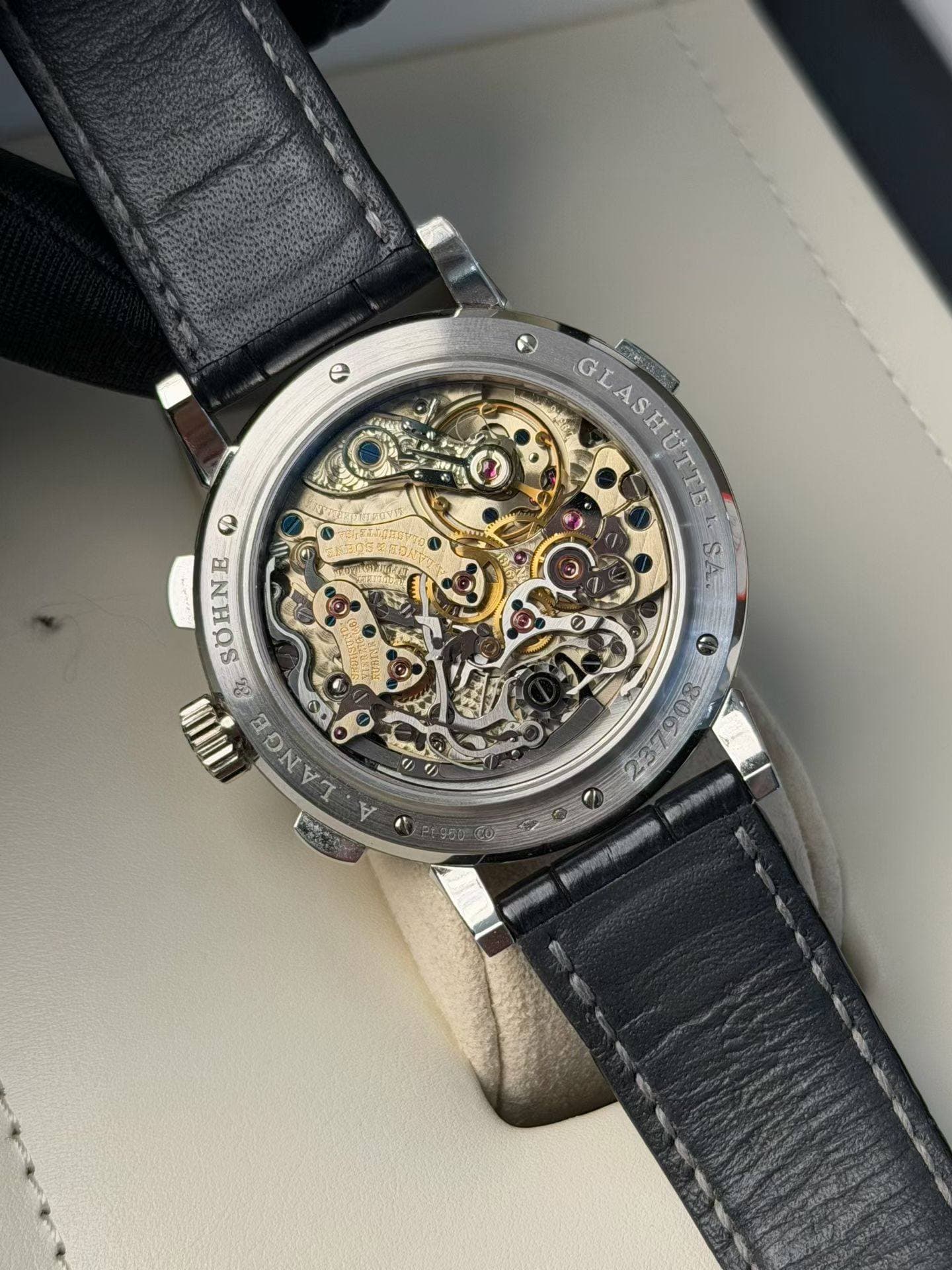 May be an image of wrist watch and text
